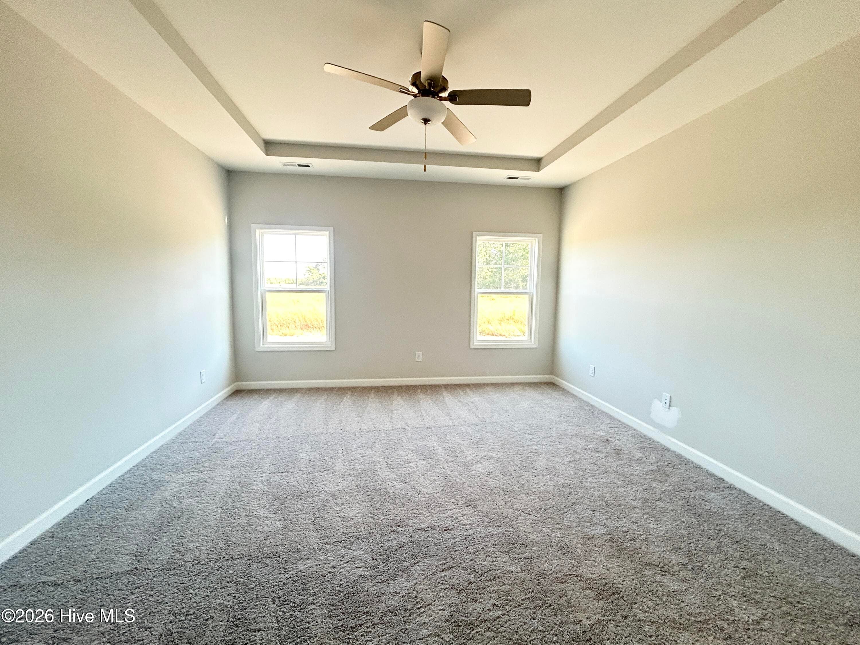 Primary suite features a Private Bathroom with Tile Shower and Large Walk-in Closet - 4208 Workman Loop 94, Leland, NC 28451