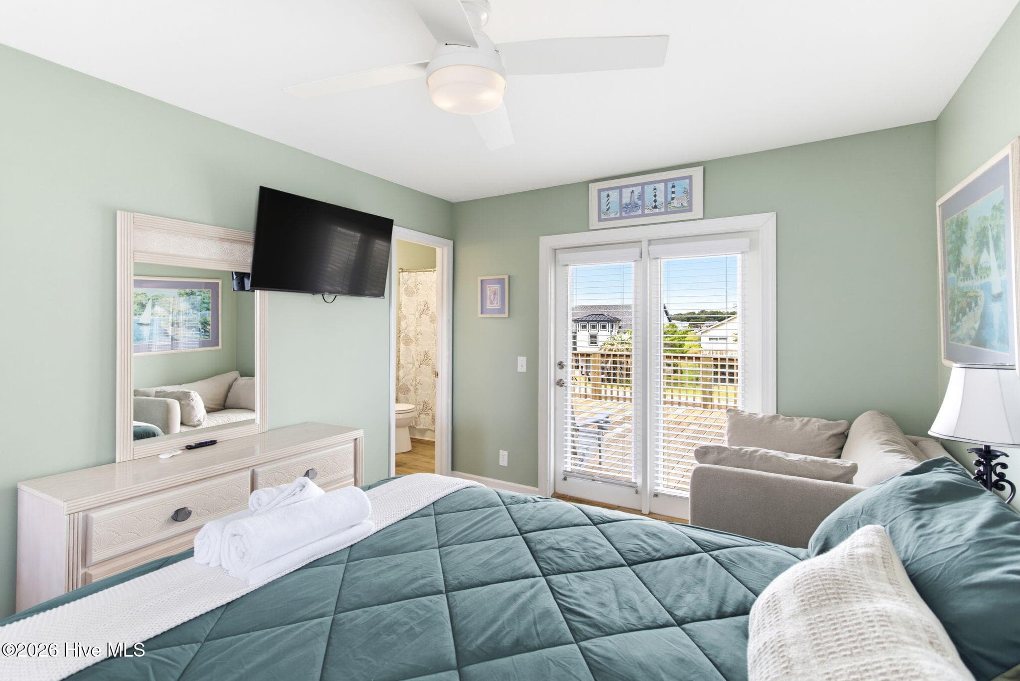 Guest bedroom with smart TV - 2330 W Beach Drive, Oak Island, NC 28465