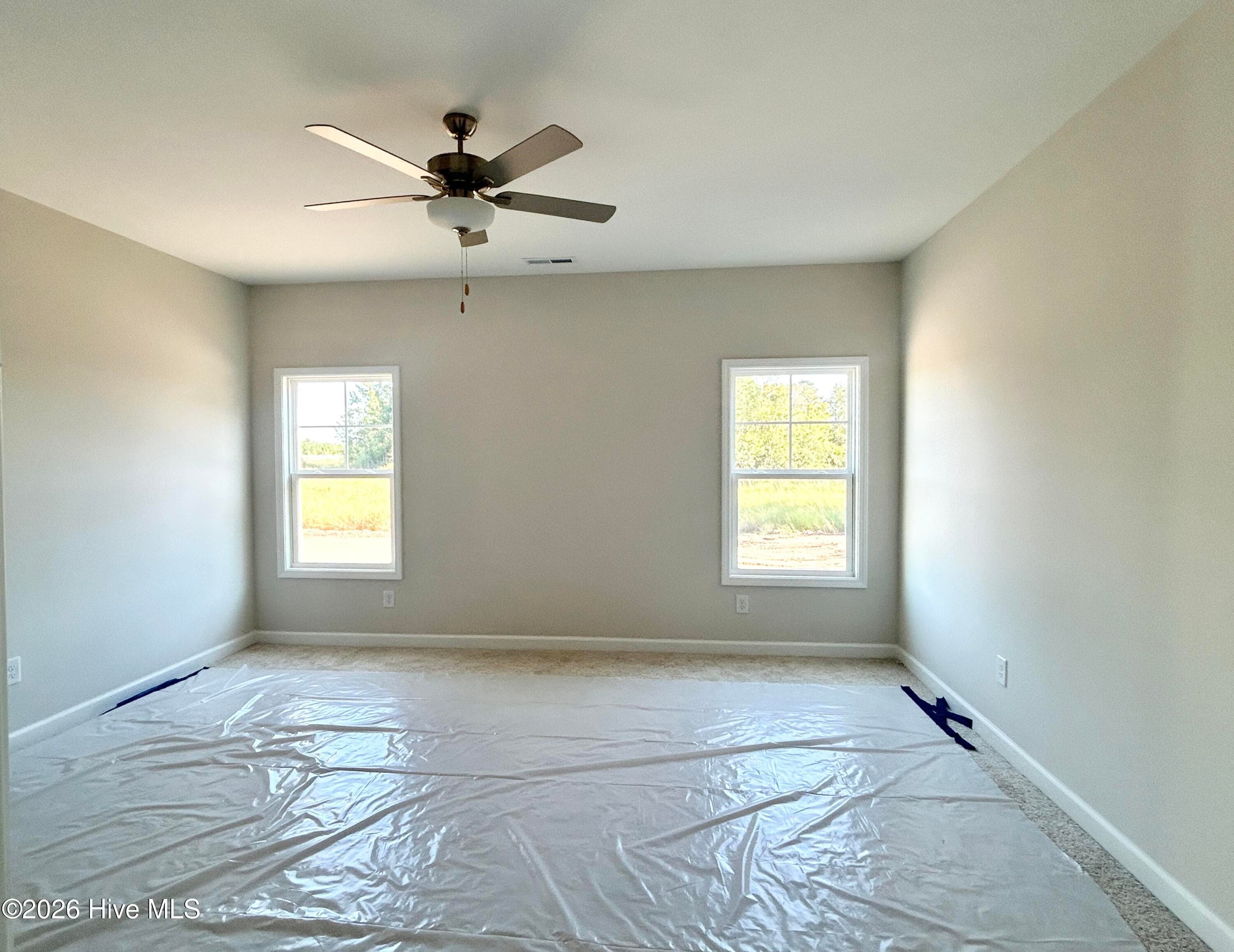 Primary suite features a Private Bathroom with Tile Shower and Large Walk-in Closet - 4192 Workman Loop 90, Leland, NC 28451