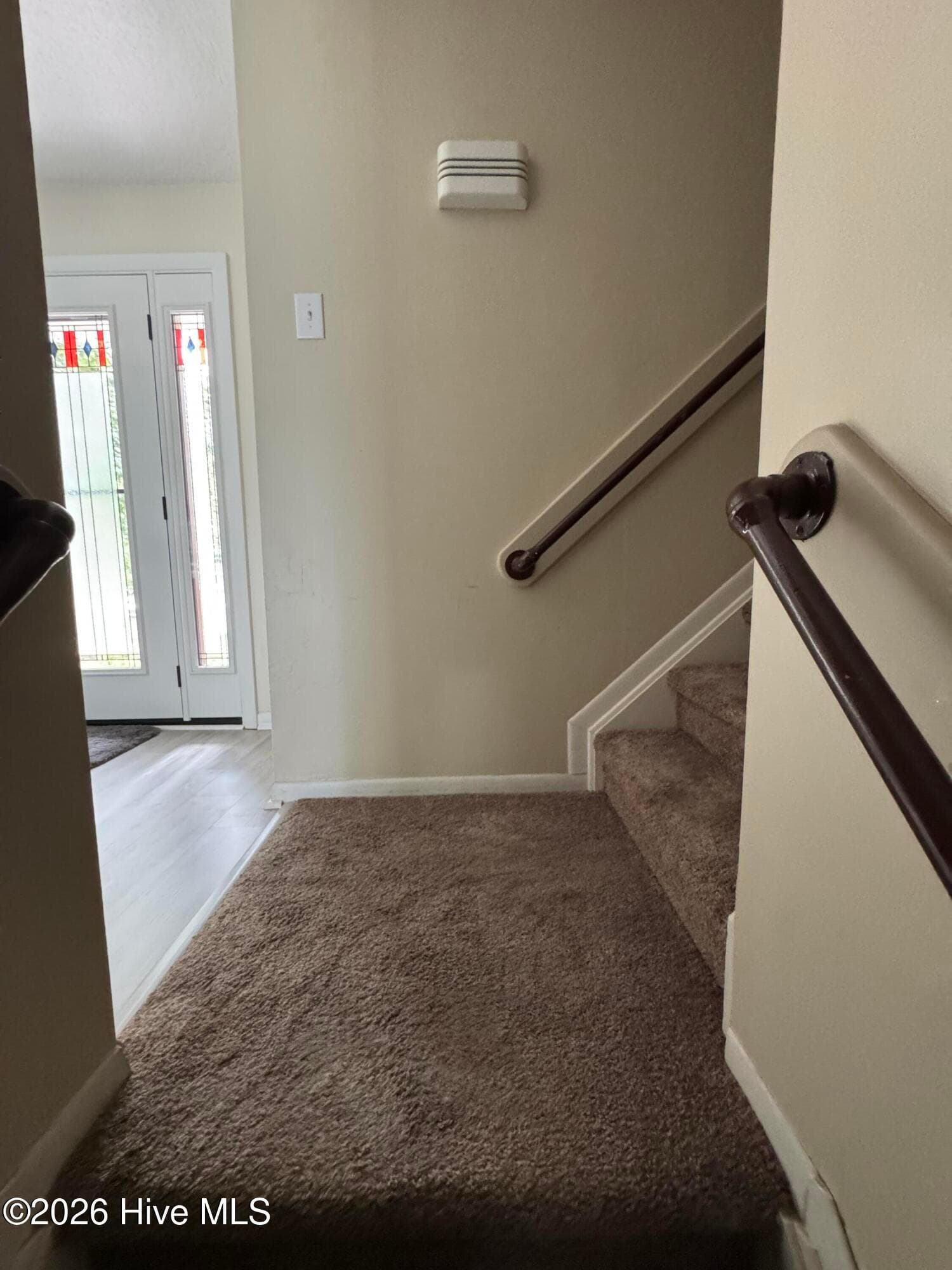 If entering through the garage to the Family Room up to the Livingroom, etc. This is the 'foyer' there. - 118 Oakwood Drive, Havelock, NC 28532