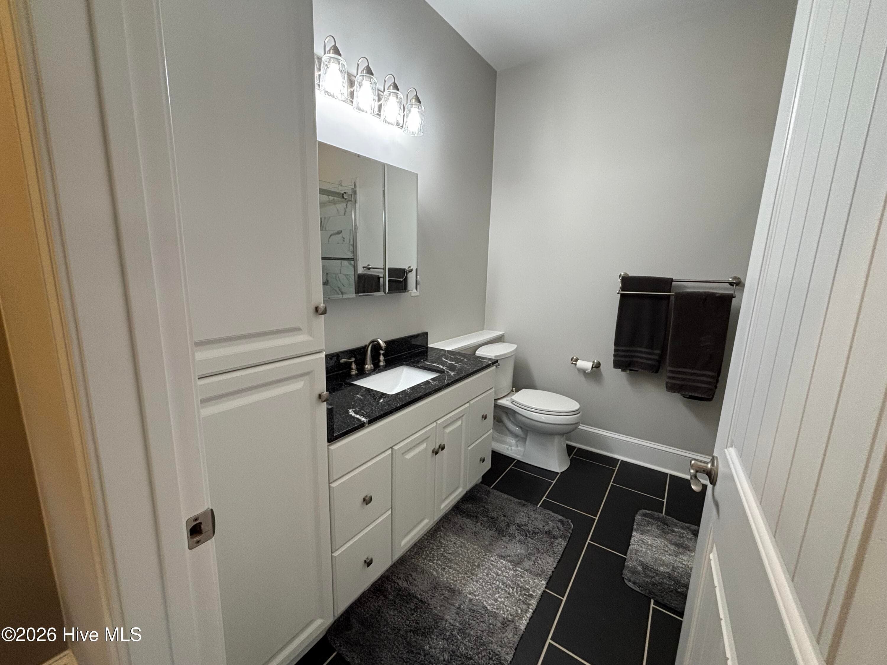 Bathroom with modern tile floors and custom shower - 593 La Wane Lane, Trenton, NC 28585