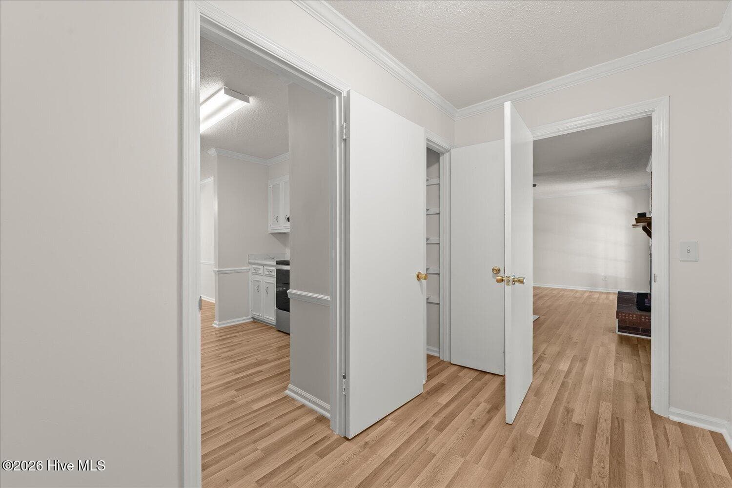 Extra room off of the kitchen leading into the living/family room with the fire place - 128 Silver Maple Court, Martinez, GA 30907