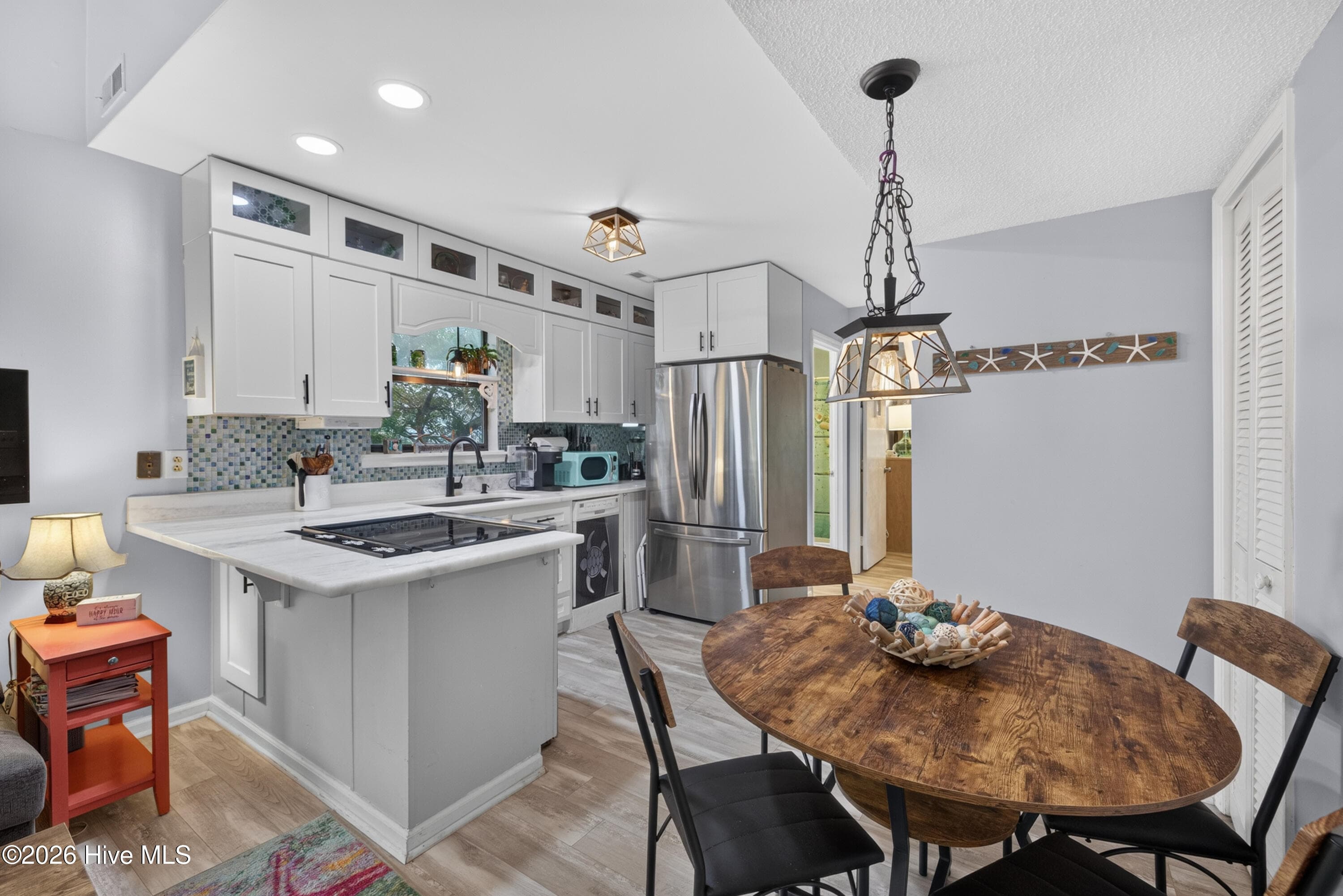 Marble counters and stainless steel appliances - 301 Bay Circle, North Topsail Beach, NC 28460