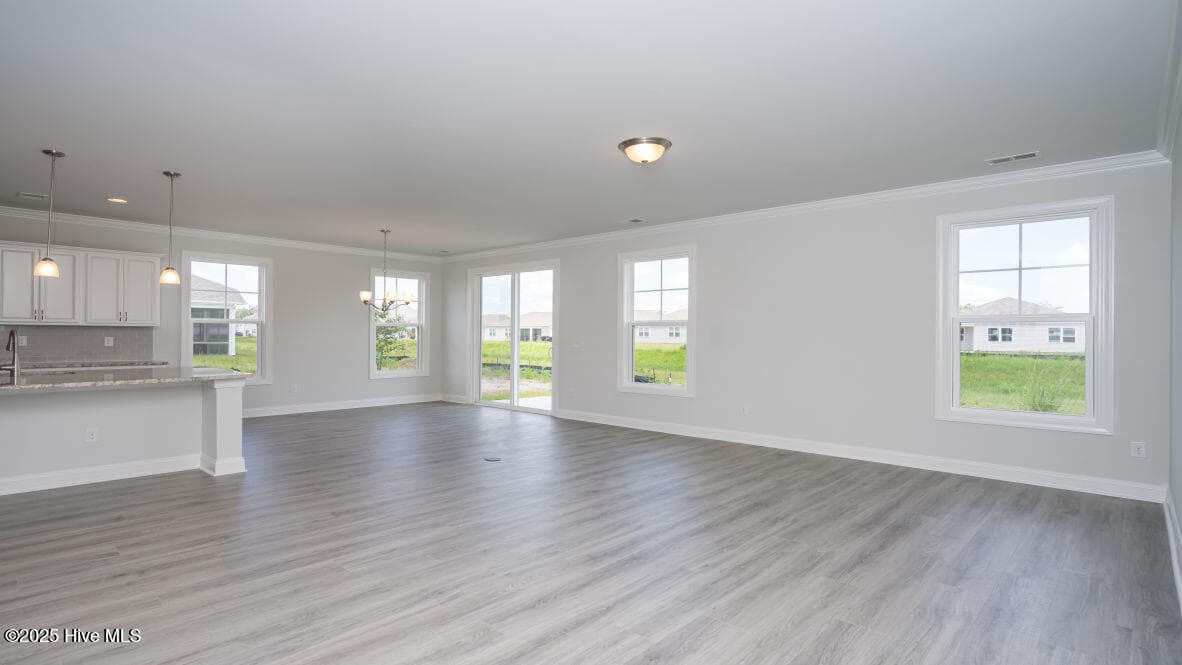 Photo is similar to actual home. Home is currently under construction. Features, colors and options may be different from those shown in representative photos. Call for detailed information. - 3221 Butterfly Ginger Street Lot 74, Leland, NC 28451