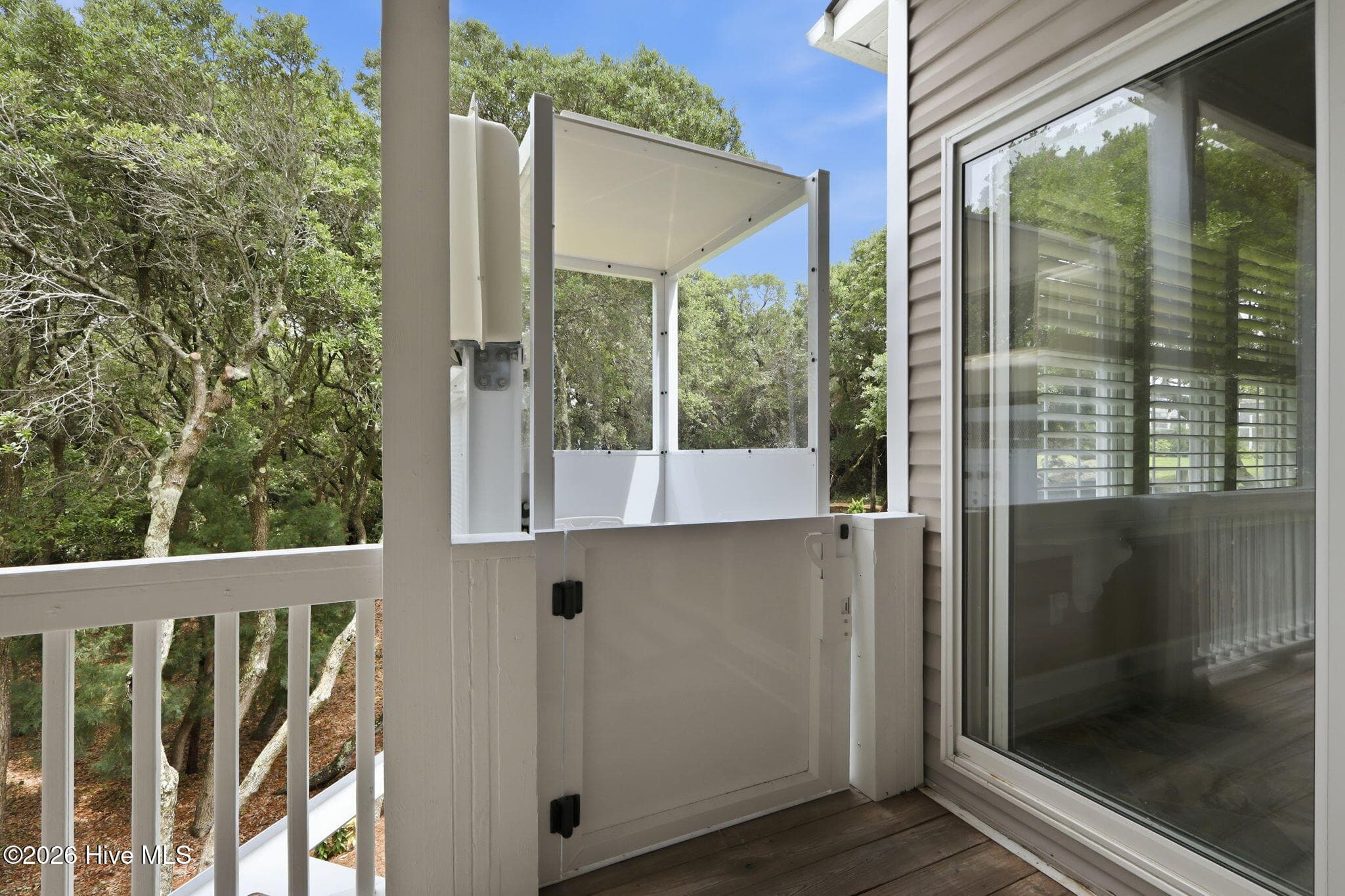Exterior enclosed elevator - 104 Talford Drive, Atlantic Beach, NC 28512