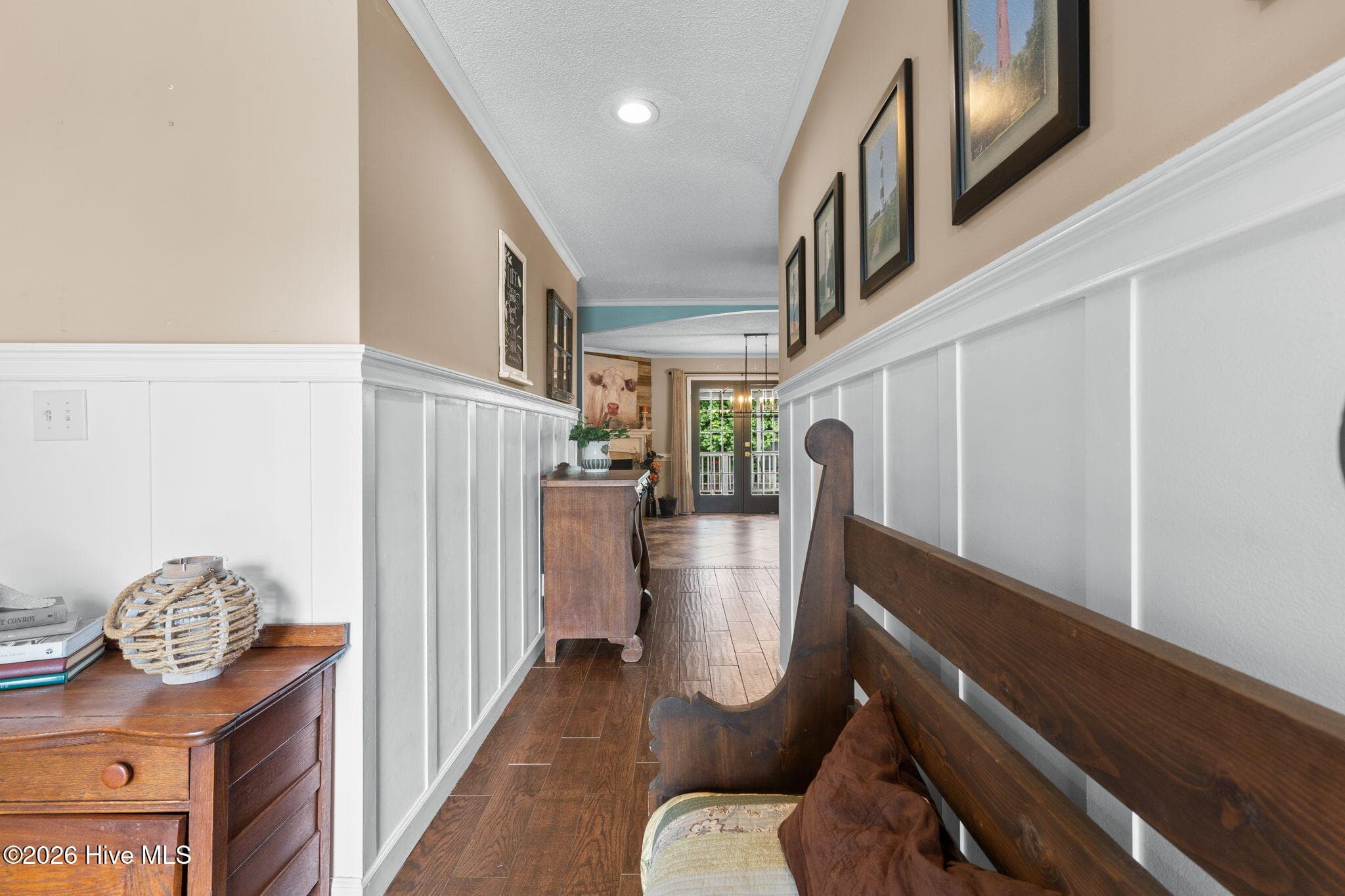 View from Front Door. Beautiful Wainscoating. - 9184 Seaside Landing SW, Calabash, NC 28467