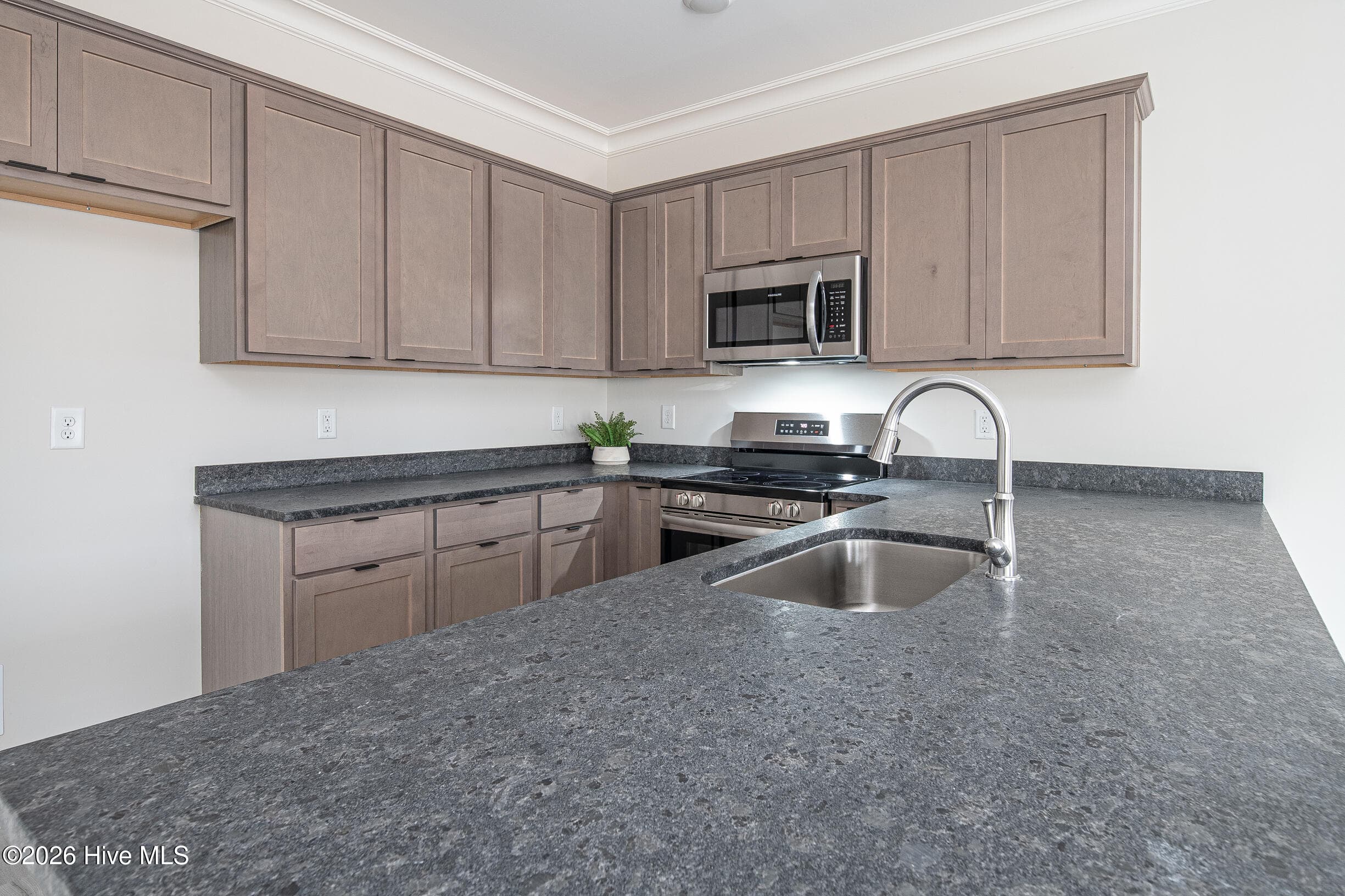A side cabinets and leathered granite - 2216 S Kali Lane A, Greenville, NC 27834