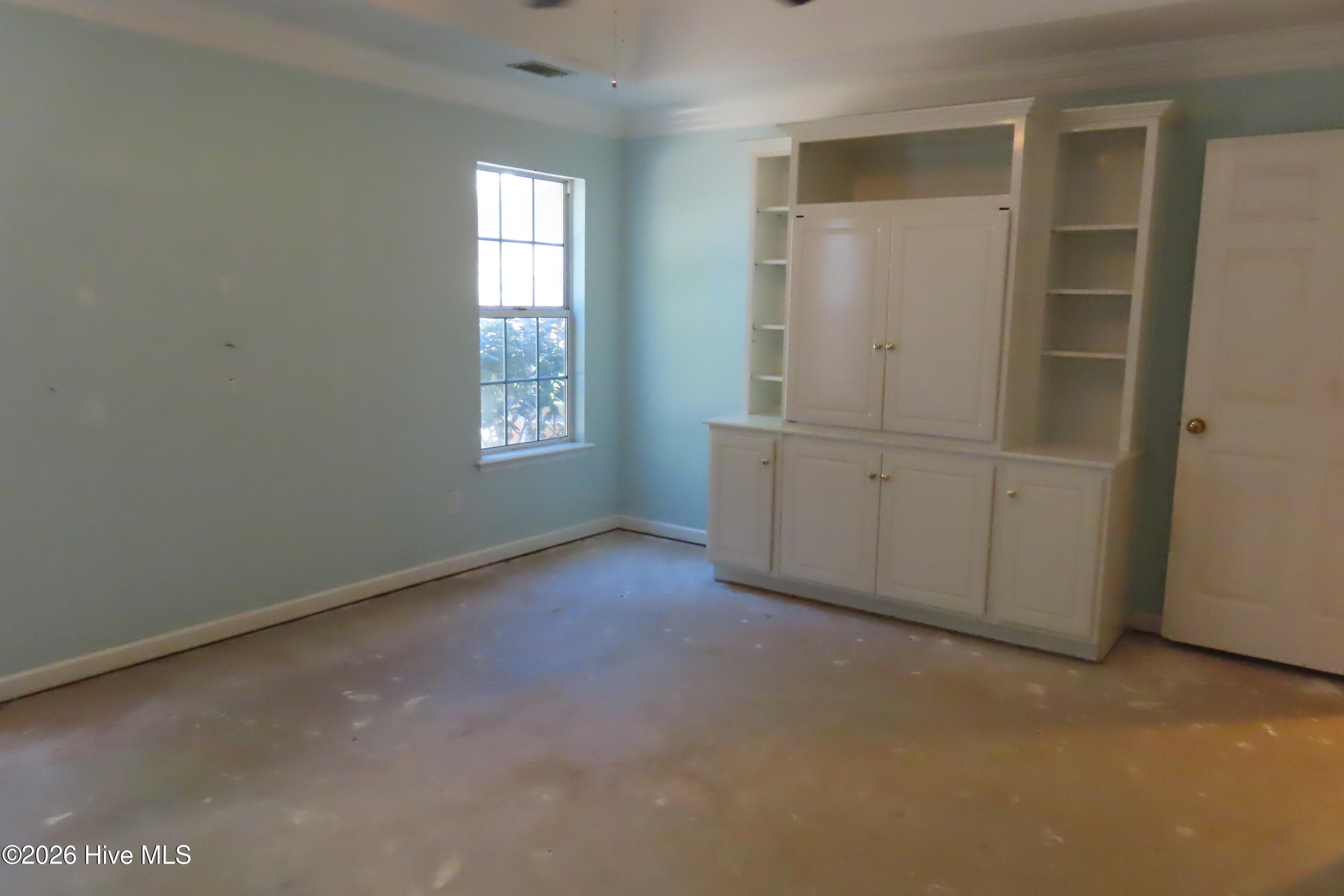 Primary bedroom with built-in cabinet - 492 Granite Point, Augusta, GA 30907
