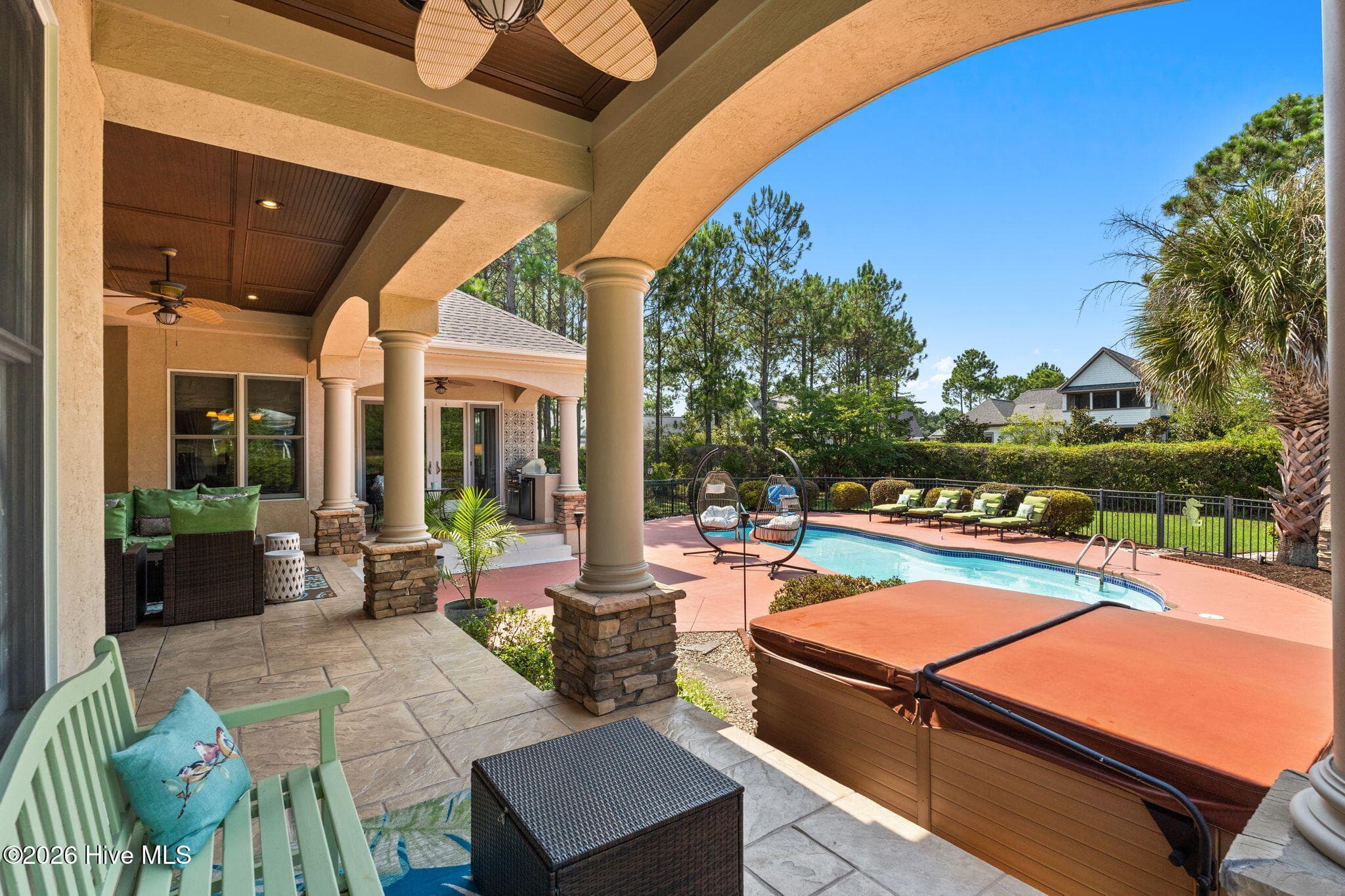 Another seating area with hot tub - 3858 Ridge Crest Drive, Southport, NC 28461