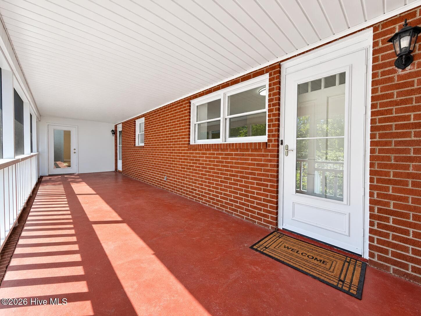 3 access points from the house to this huge screened porch. Plenty of room for a sitting area and dining. - 320 Northern Boulevard, Wilmington, NC 28401