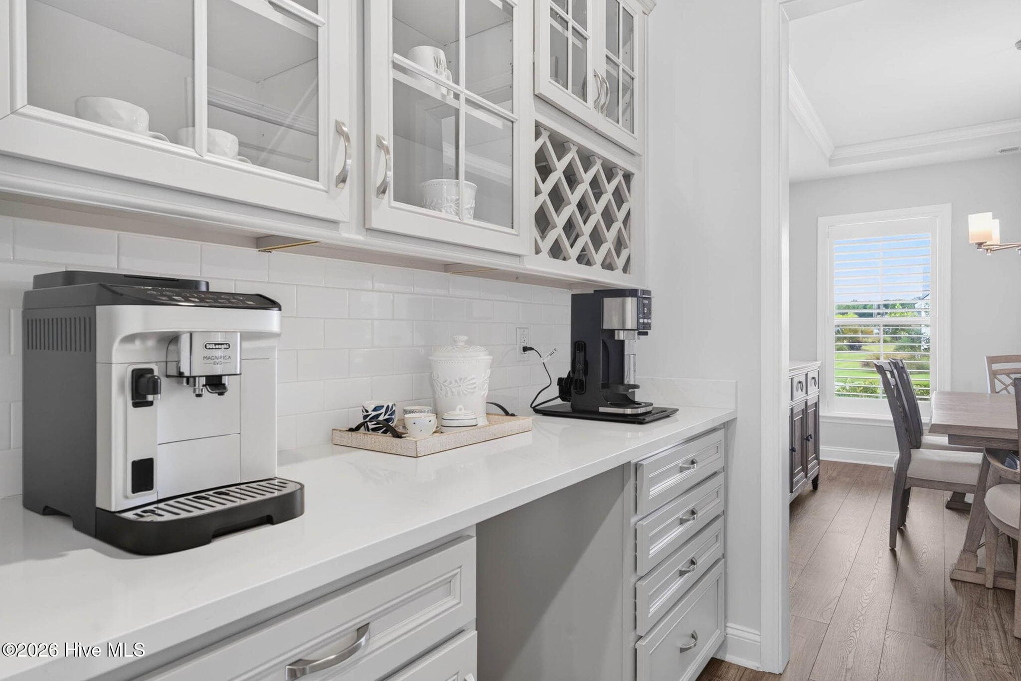 A convenient butler’s pantry connects the formal dining room and kitchen while offering additional cabinetry and counter space. - 139 Eagle Claw Drive, Calabash, NC 28467