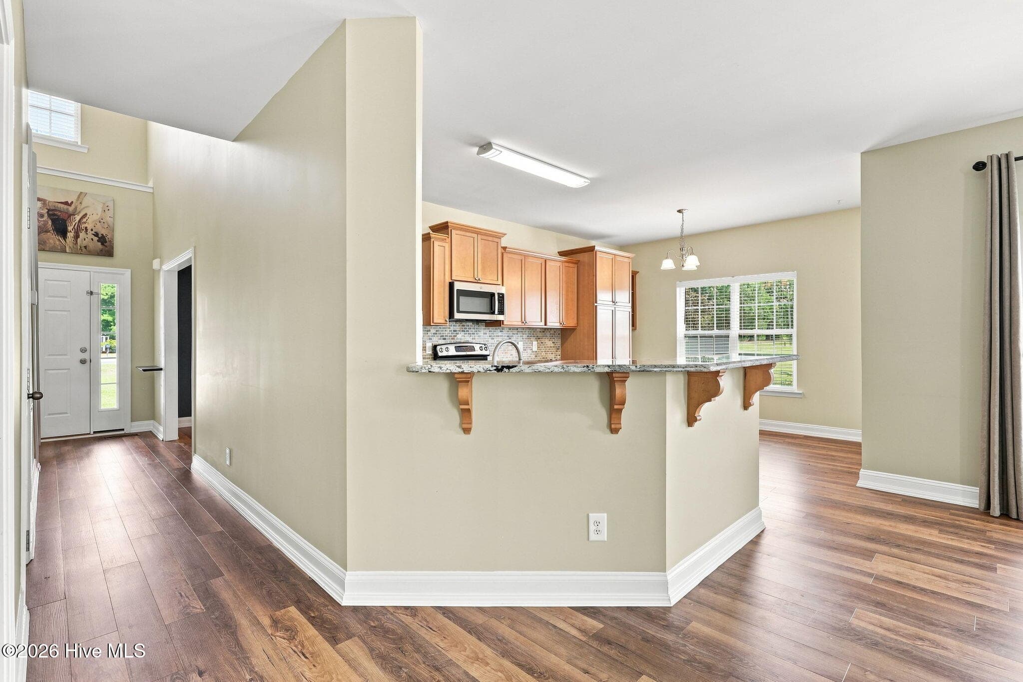 Kitchen Bar Area Opens to Living Room - 1284 L Cooper Road, Cameron, NC 28326