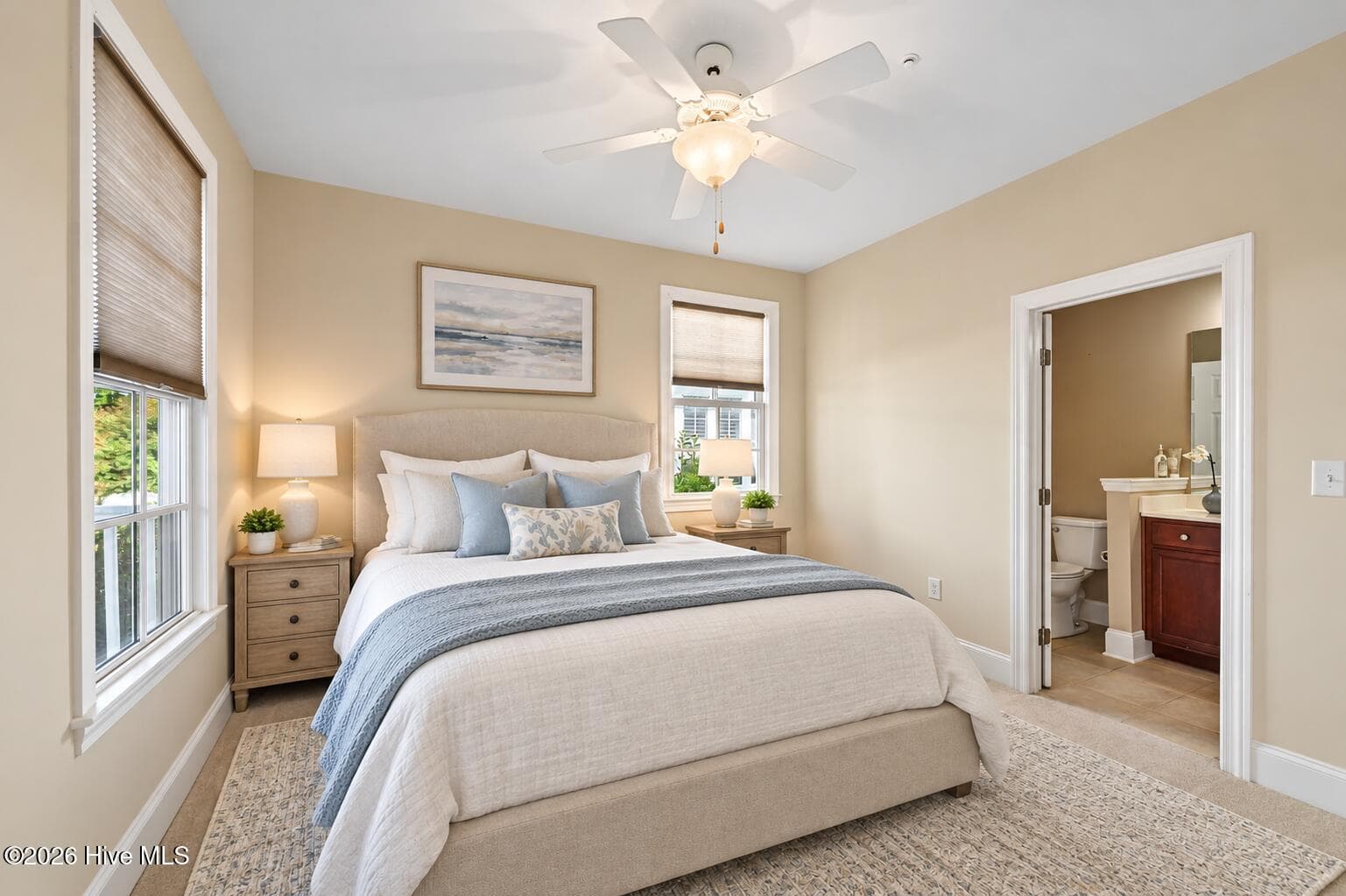 Furniture is Virtually Staged Bedroom #1 with adjoining bathroom on Main Floor. - 207 S Academy Street, Washington, NC 27889