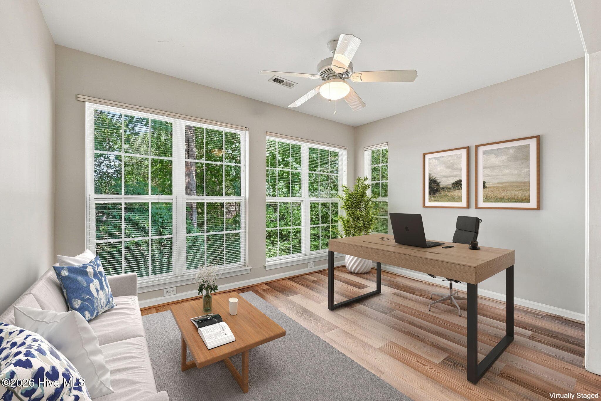 Virtually staged sunroom - 2209 Locksley Woods Drive G, Greenville, NC 27858