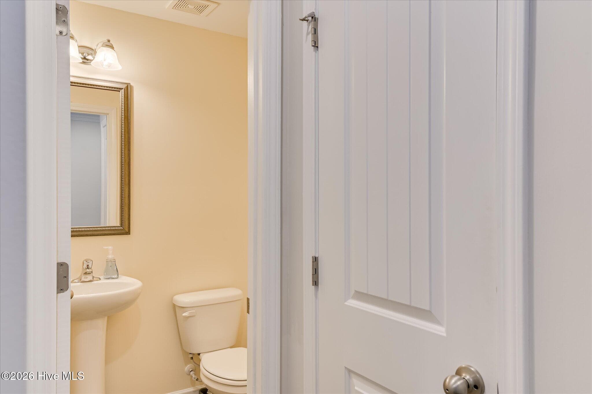 MAIN LEVEL half bath (powder room) - 4033 Thimbleberry Drive, Graniteville, SC 29829