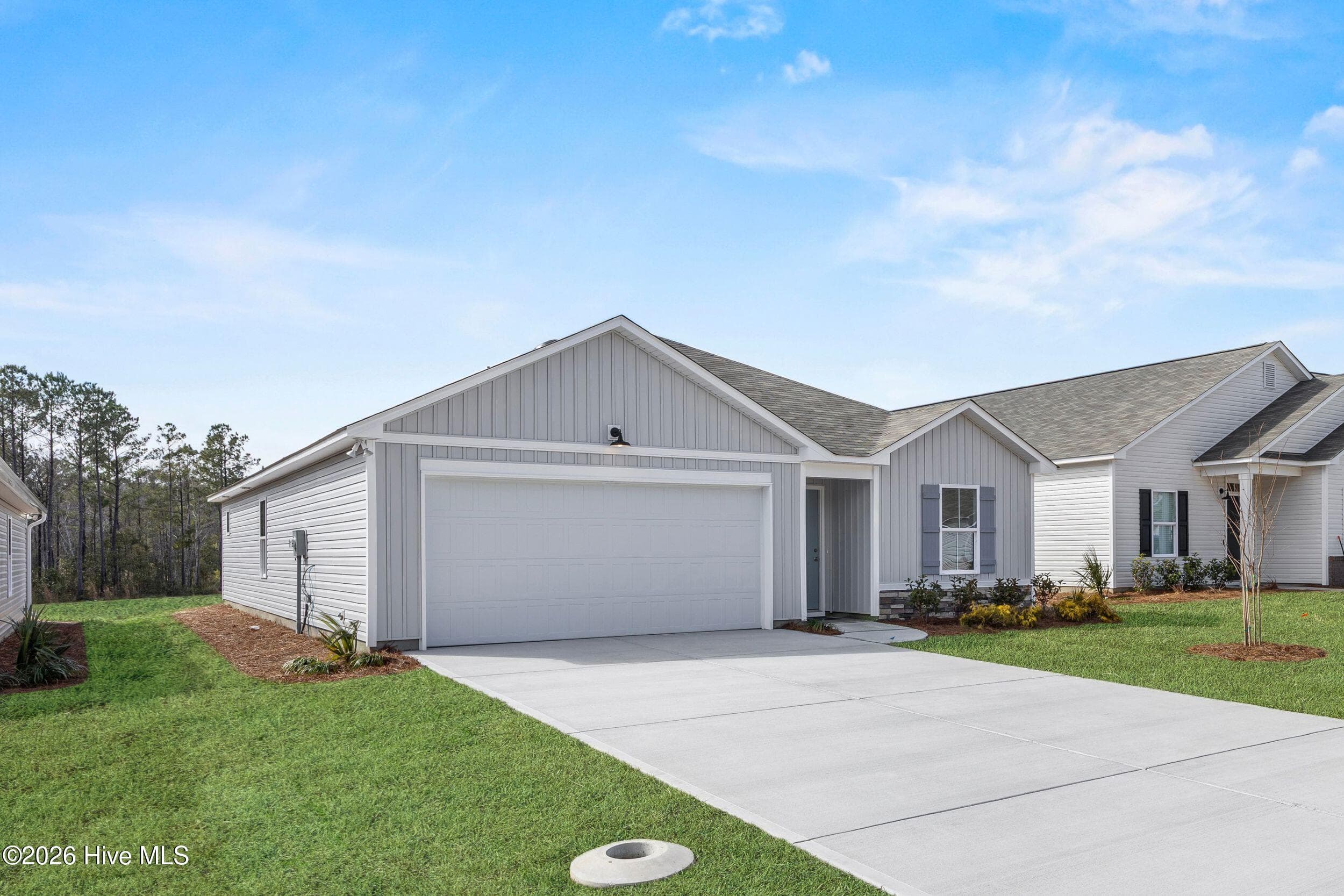 Home shown is a representation of the Highland floor plan with farmhouse elevation. - 4608 Swimming Lane 53, Shallotte, NC 28470, Shallotte