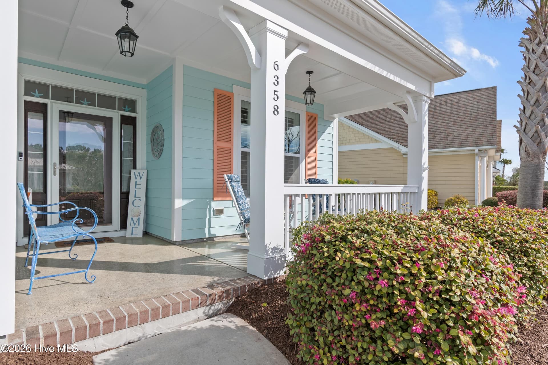 Front porch seating area. - 6358 Bryson Drive SW, Ocean Isle Beach, NC 28469