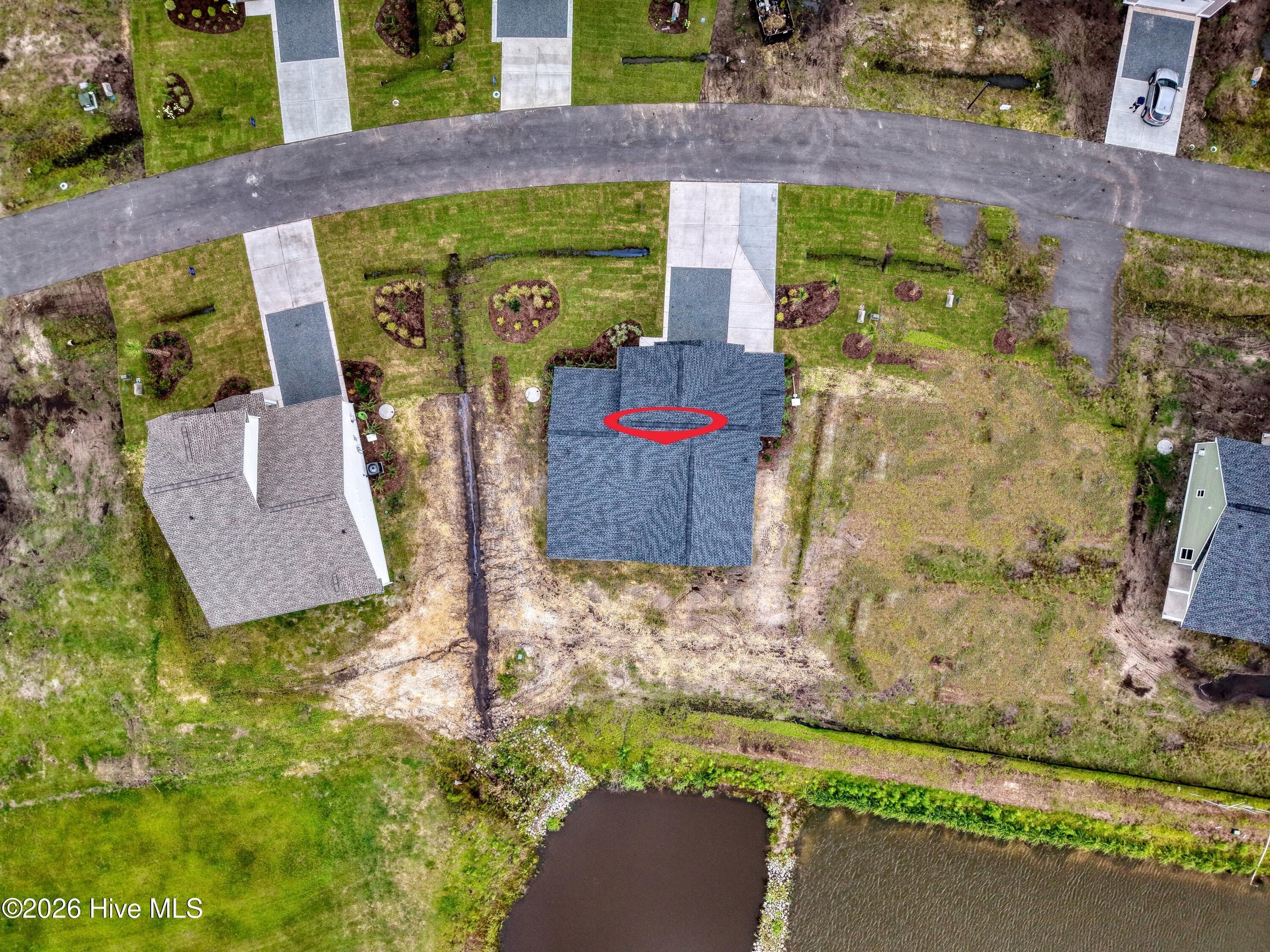 Rear yard with pond view and golf course view - 2114 Cregan Cove SW (Lot 3), Ocean Isle Beach, NC 28469