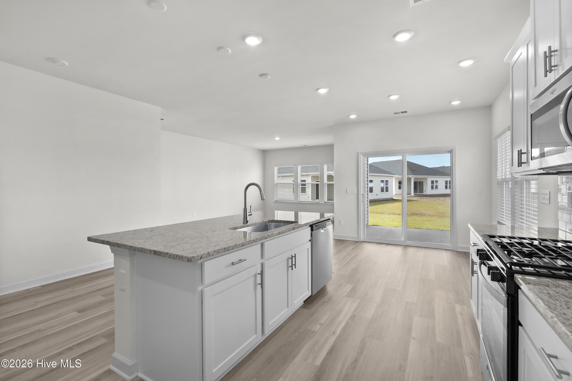 Photo is not of the actual home, but is an example photo of a completed home and may depict options and/or features that are not included - 4154 Generations Circle NW, Ash, NC 28420