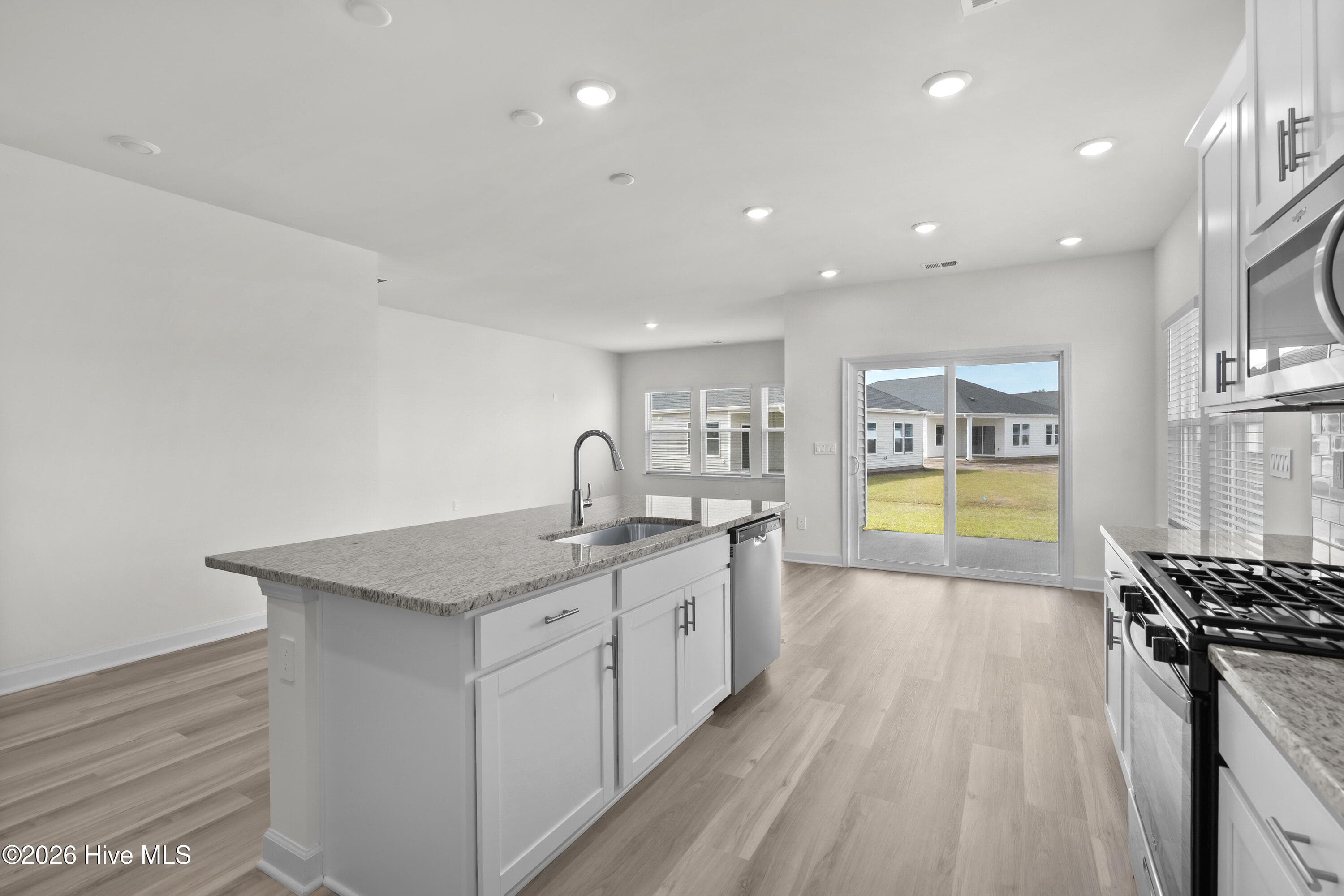Photo is not of the actual home, but is an example photo of a completed home and may depict options and/or features that are not included - 4154 Generations Circle NW, Ash, NC 28420
