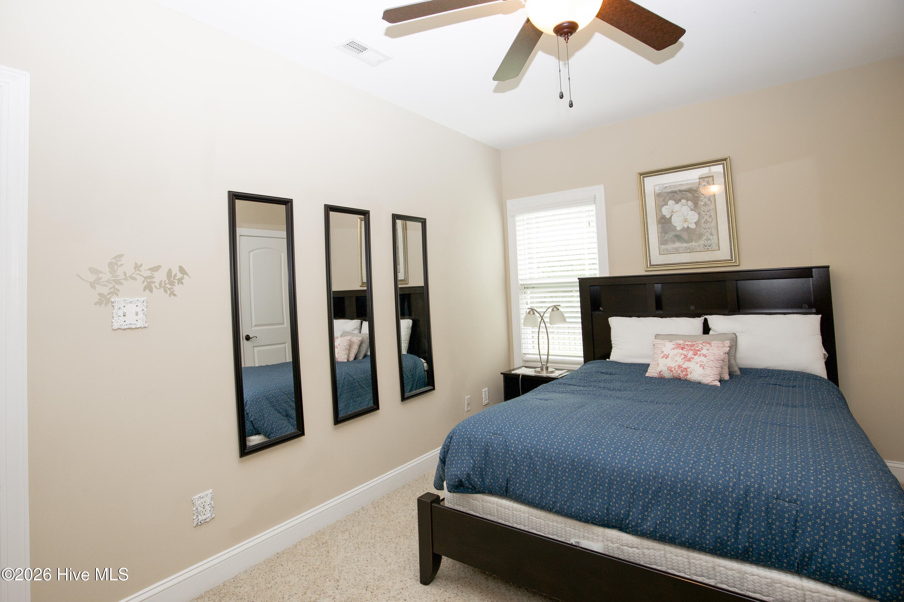 Second lower-level bedroom. - 899 Seagull Drive, Vass, NC 28394, Vass
