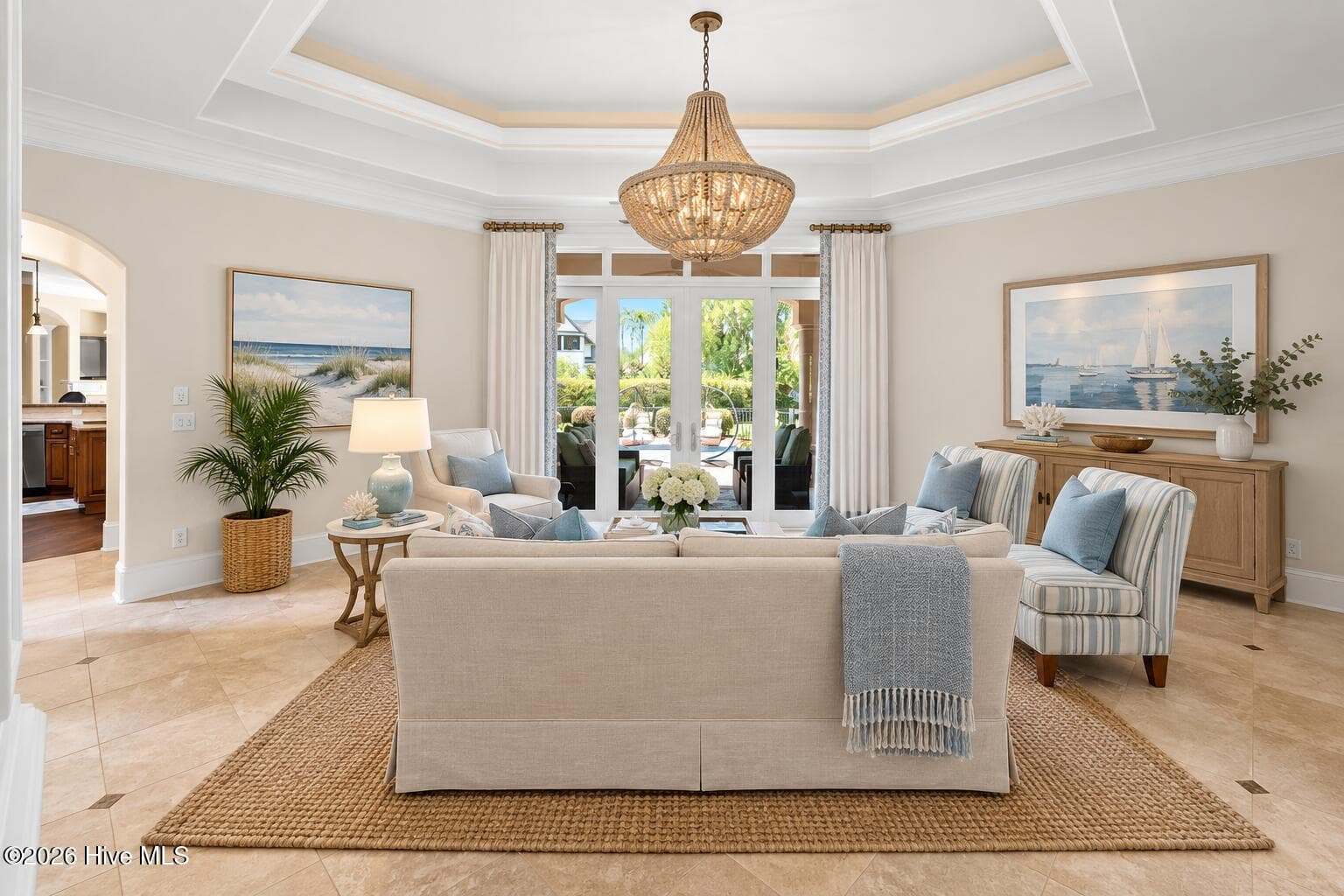 AI generated photo showing living room with coastal feel - 3858 Ridge Crest Drive, Southport, NC 28461