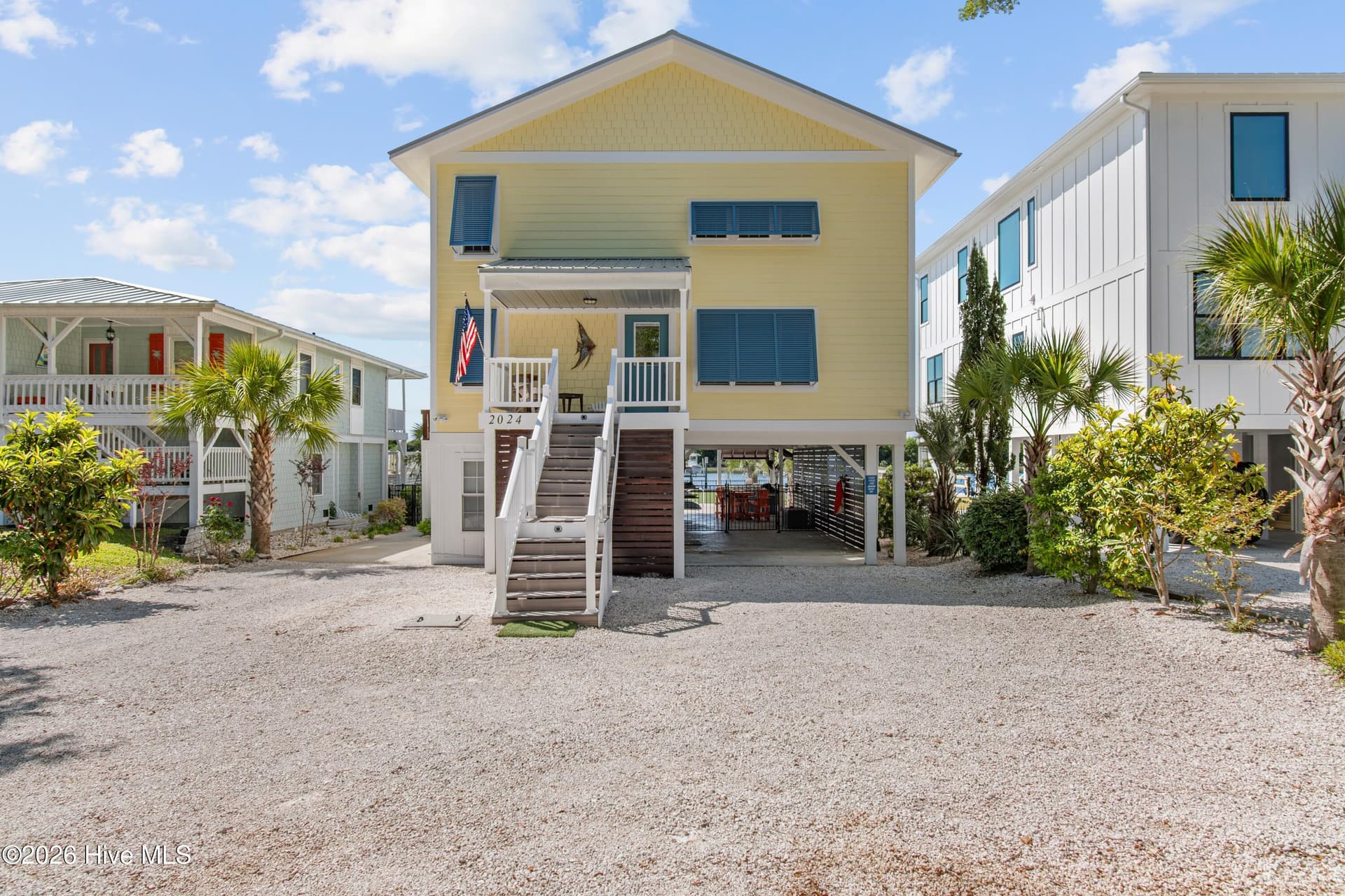 Street view of home. Tons of space for parking! - 2024 Camelot Drive SW, Ocean Isle Beach, NC 28469