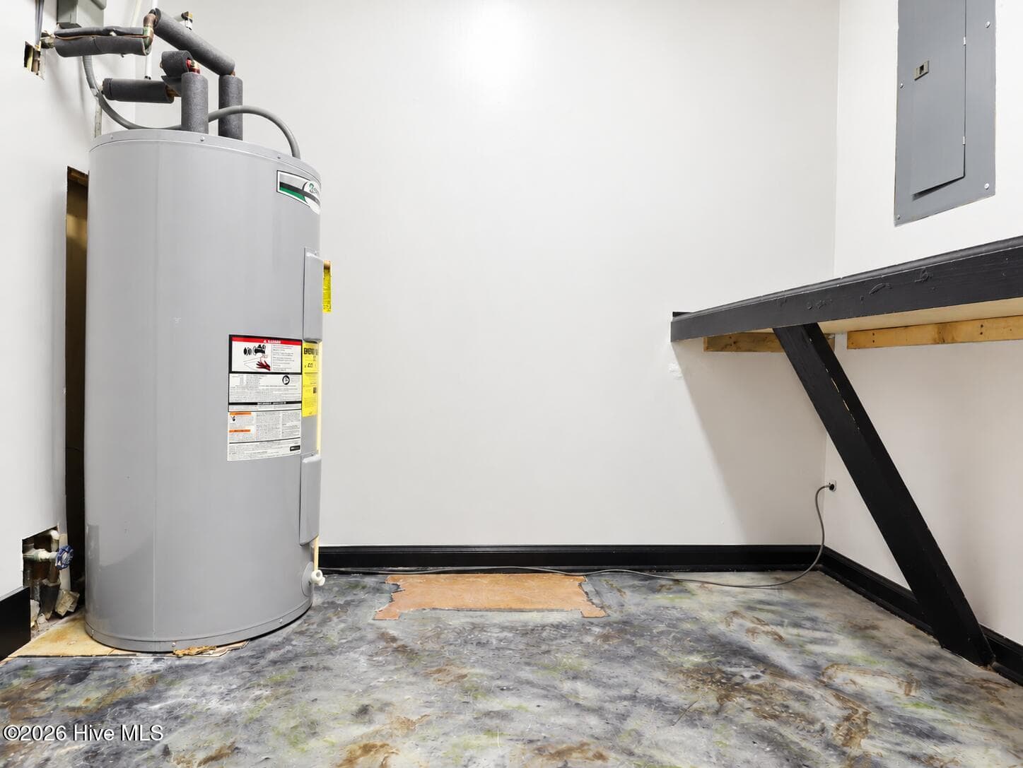 Utility / work room with workbench and water heater - 3133 Vass-carthage Road, Carthage, NC 28327