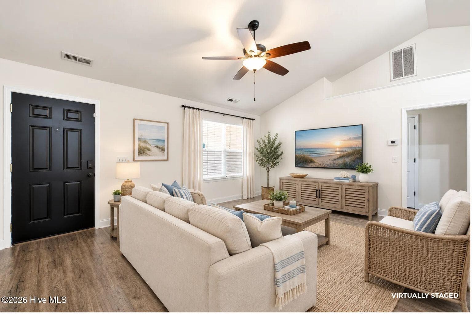 Virtually staged living room - 122 Pond View Circle, Hampstead, NC 28443