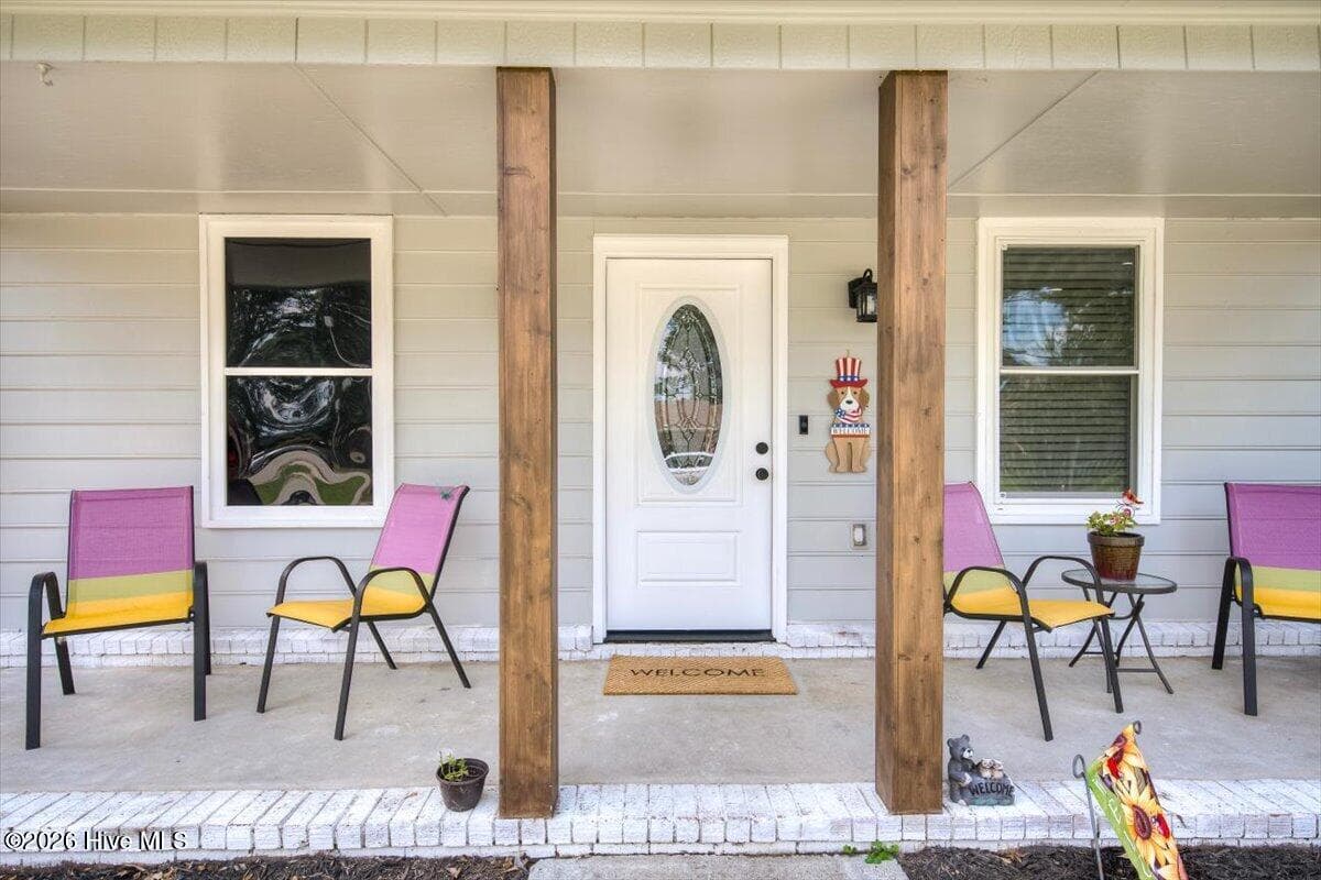 Covered front porch with attractive glass door at entrance - 4121 Langley Street, Martinez, GA 30907