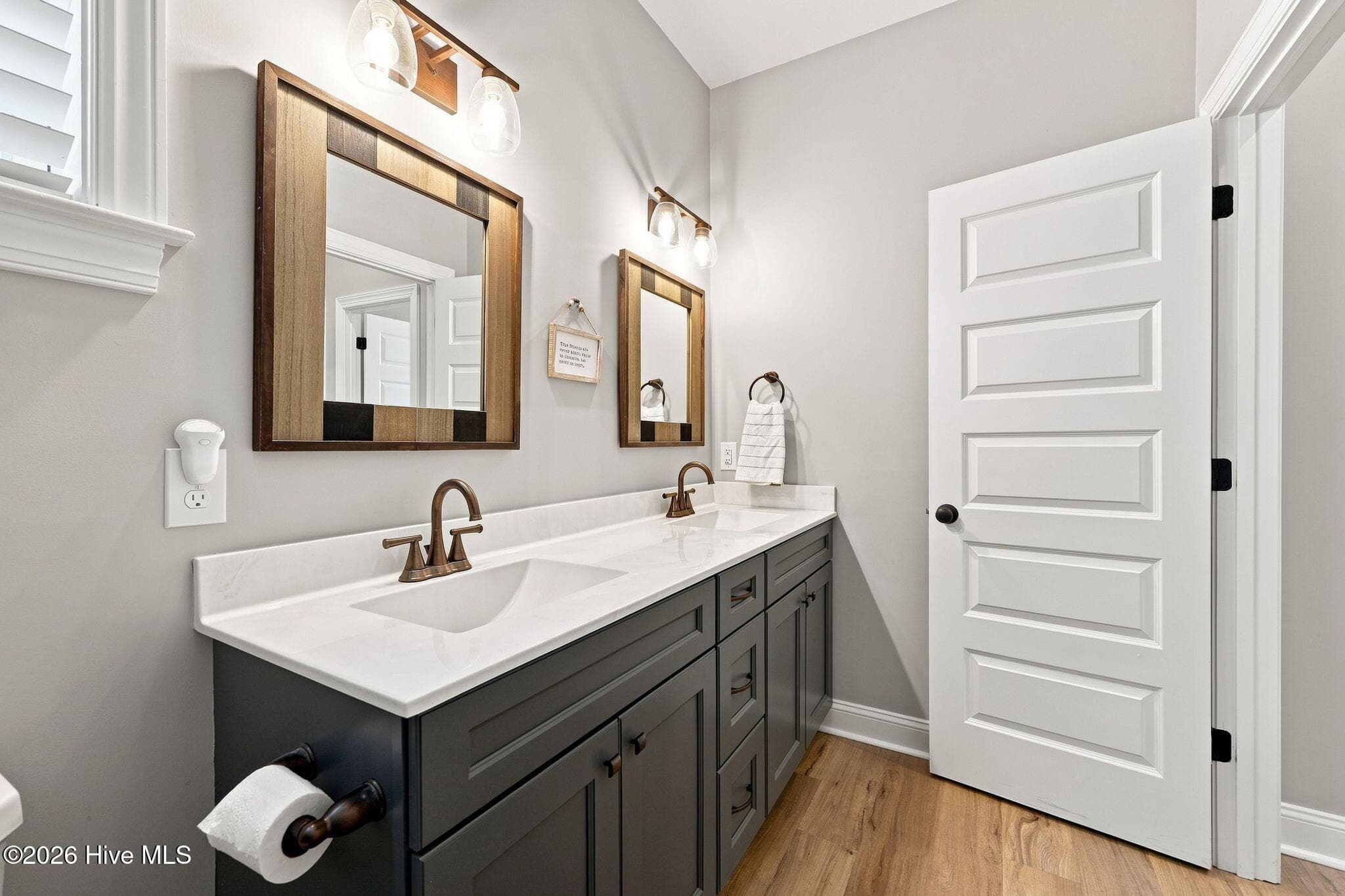 Second full bathroom with double vanity sinks - 2212 Marinwood Court, Greenville, NC 27834