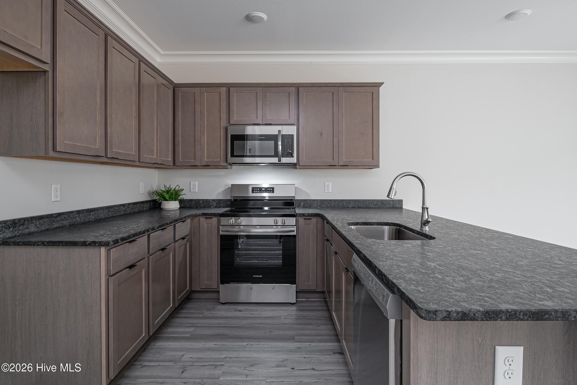 A side cabinets and leathered granite - 2216 S Kali Lane A, Greenville, NC 27834