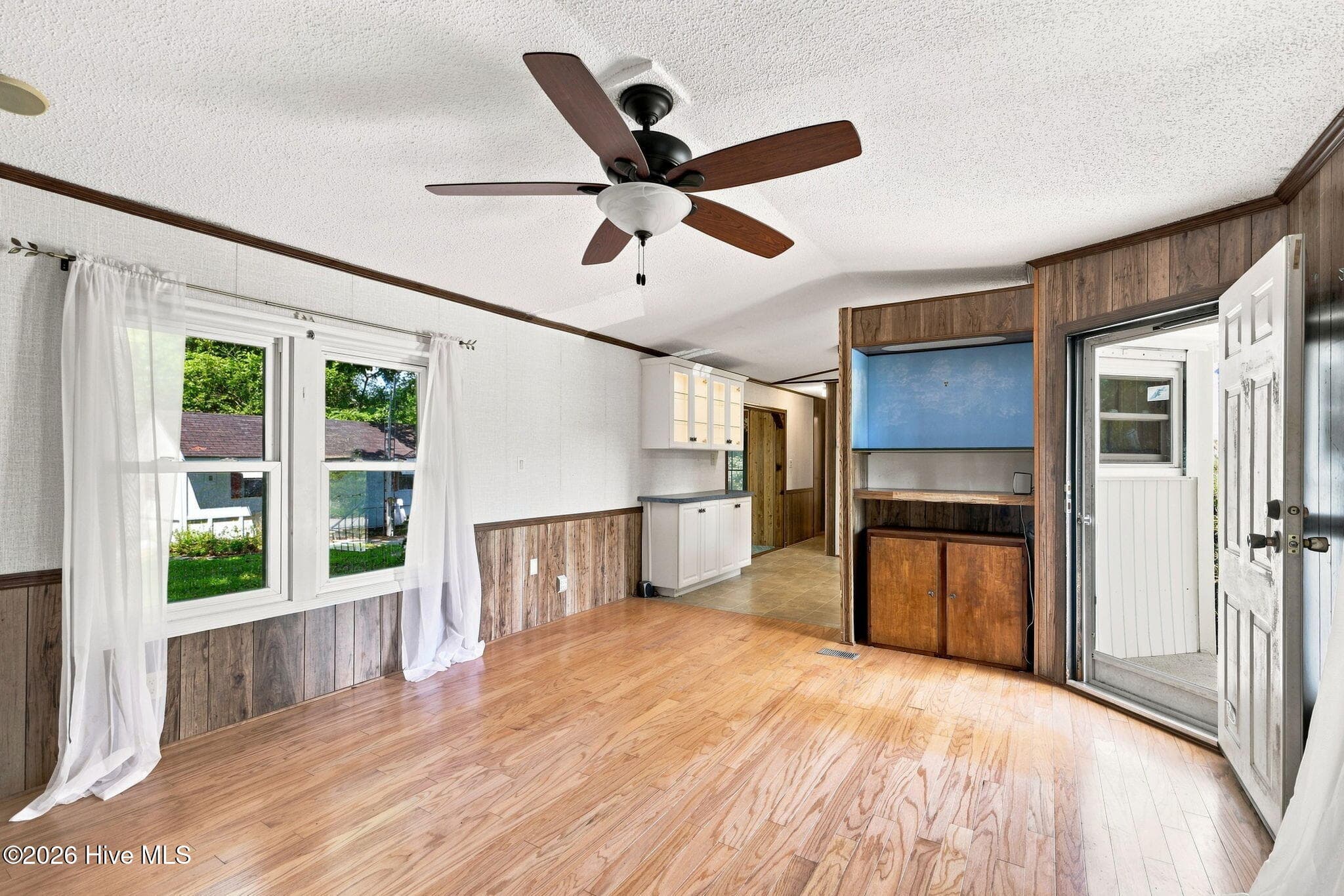 Living room to kitchen - 114 Lejeune Road, Cape Carteret, NC 28584