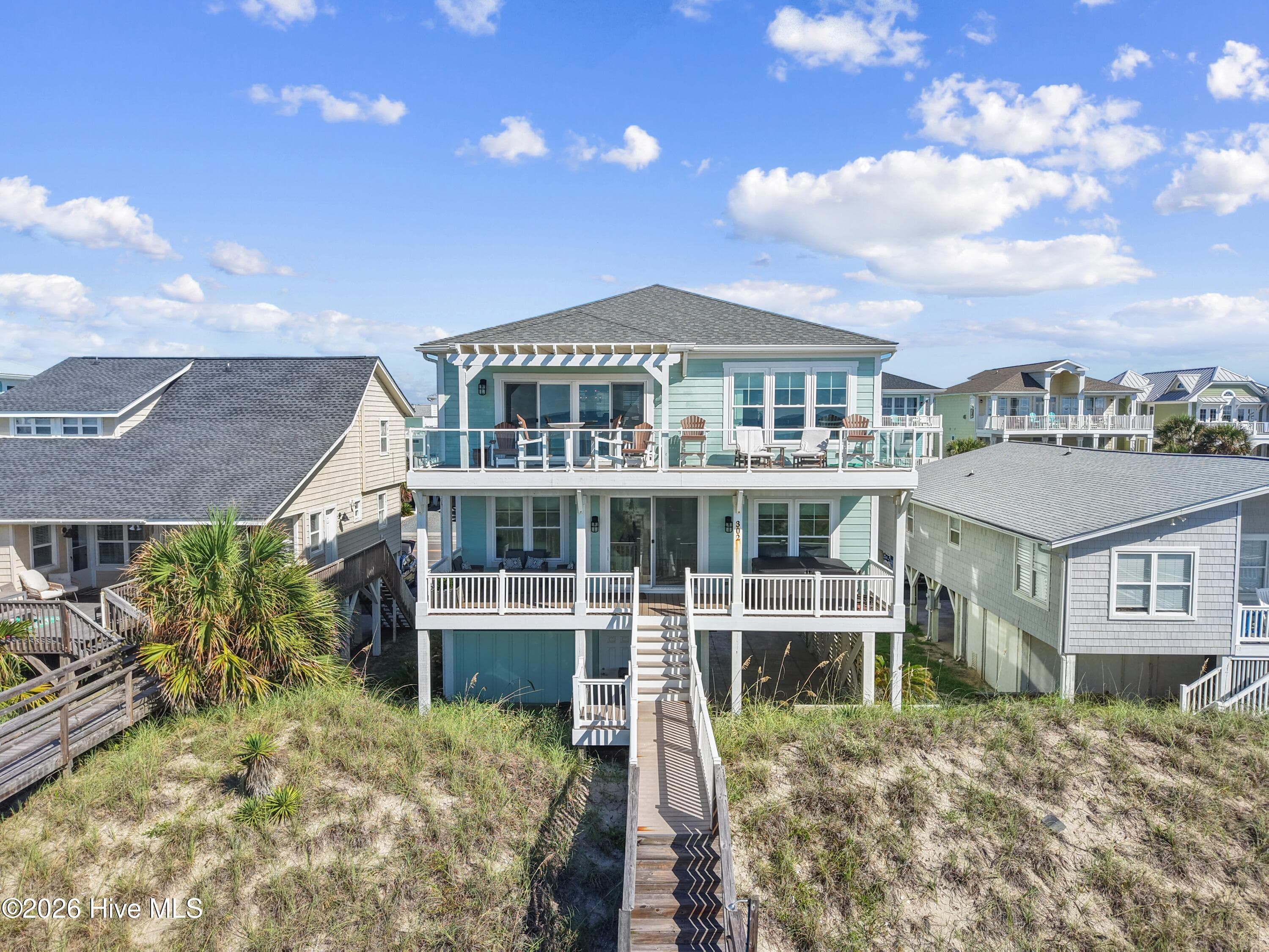 Single Family Residence at 302 E First Street, Ocean Isle Beach, NC 28469, photo 2 of 79