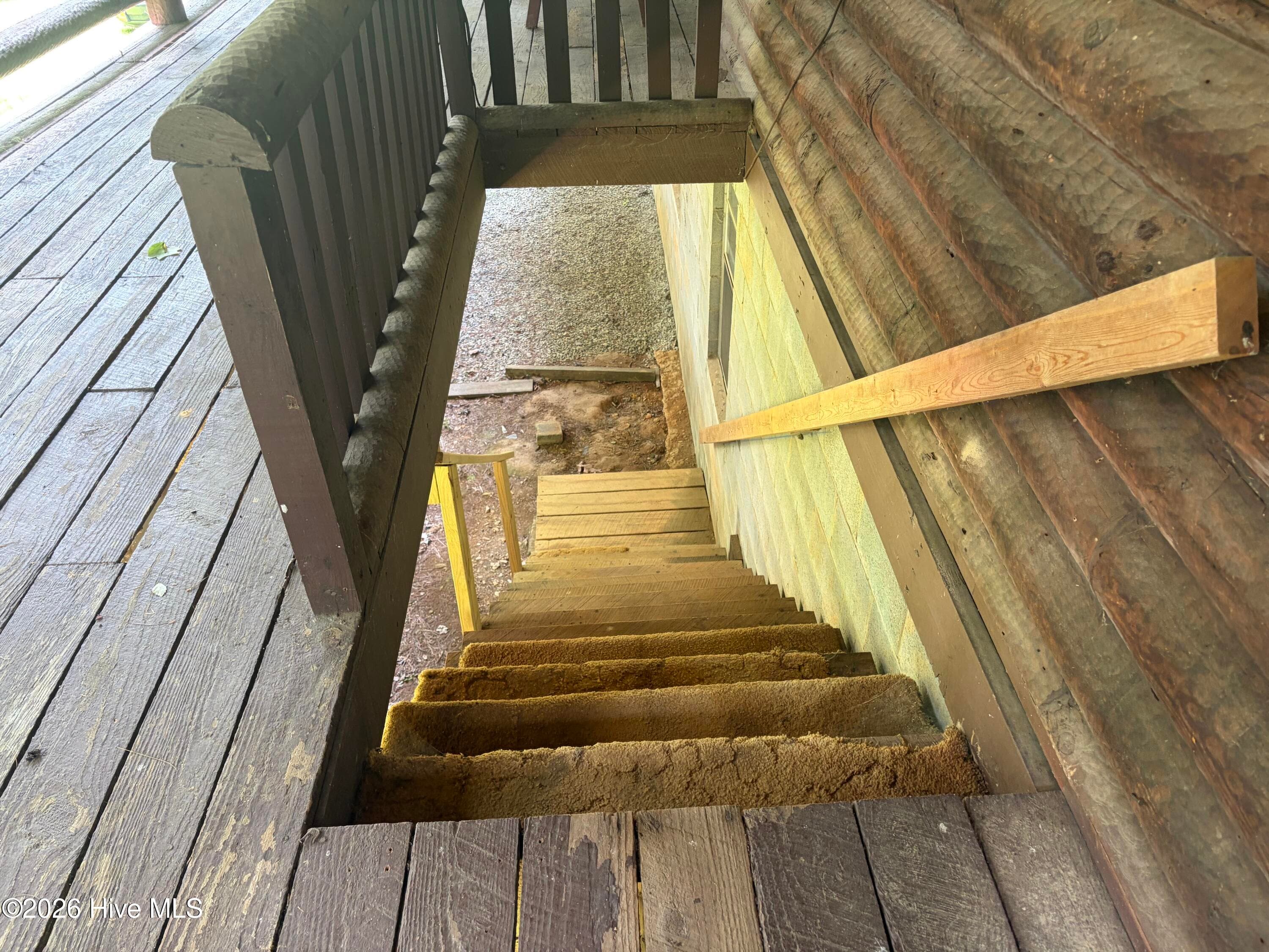 Stairs from porch to basement/ground level - 913 Franks Creek Road, Robbinsville, NC 28771