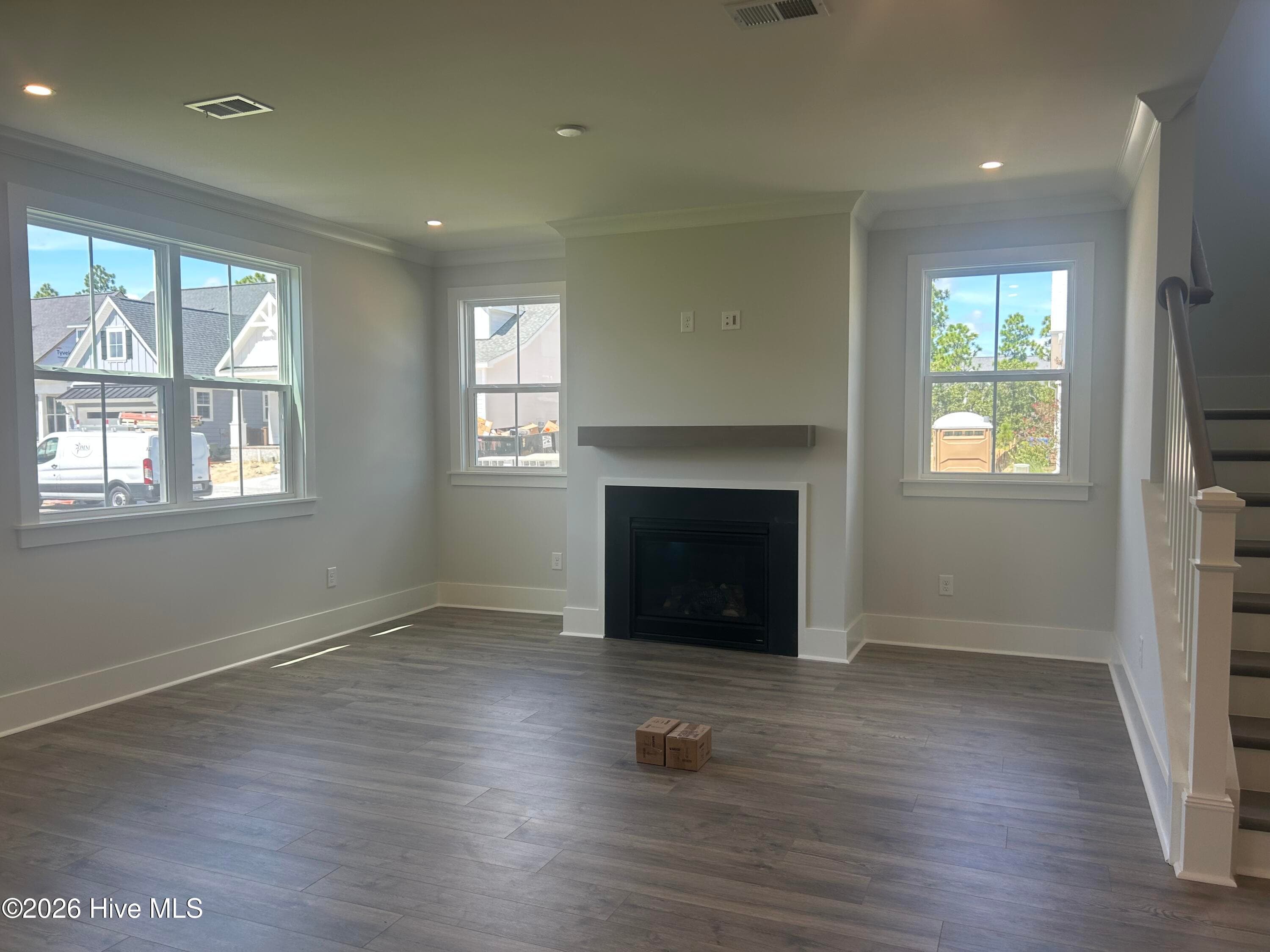 Living Room with natural gas fireplace - 5202 Moonshell Loop, Wilmington, NC 28412