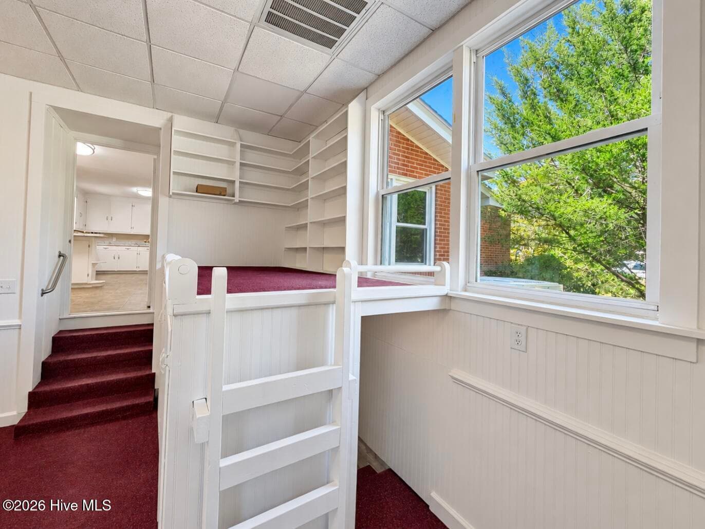 Door to kitchen/ breakfast area to the right, stairs to basement under loft to the right. - 320 Northern Boulevard, Wilmington, NC 28401