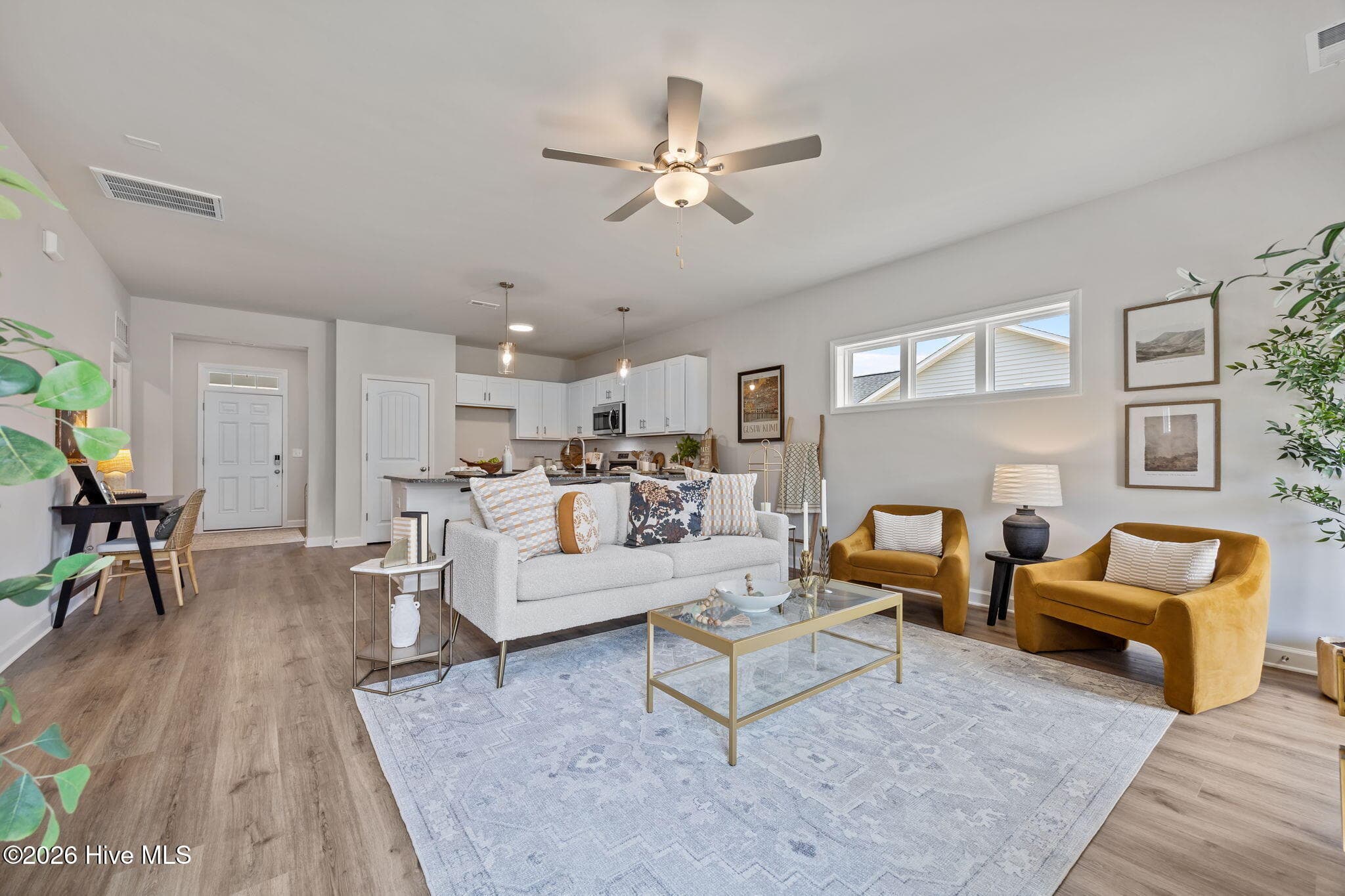 Example photo of similar home with staging. Actual home is under construction. - 9125 Carly Lane 63, Leland, NC 28451