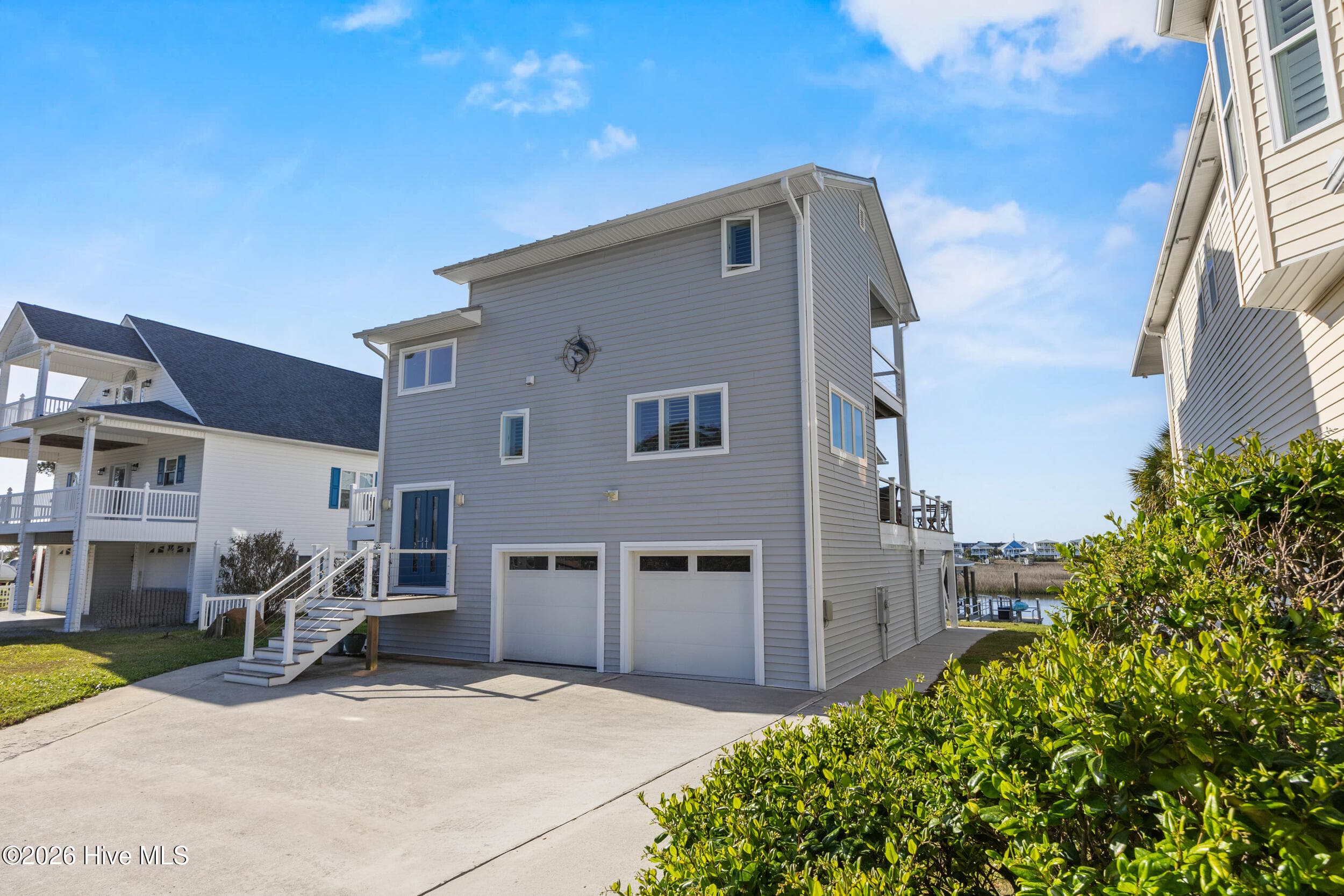 Single Family Residence at 103 E Island Drive, Oak Island, NC 28465, photo 110 of 118