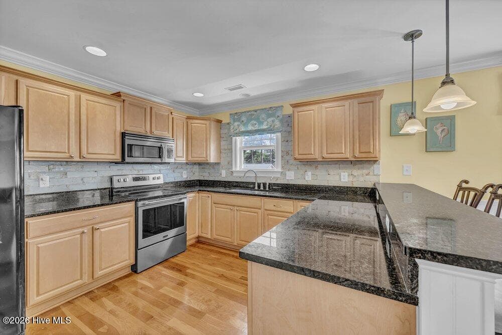 Single Family Residence at 104 NE 8th Street, Oak Island, NC 28465, photo 12 of 48
