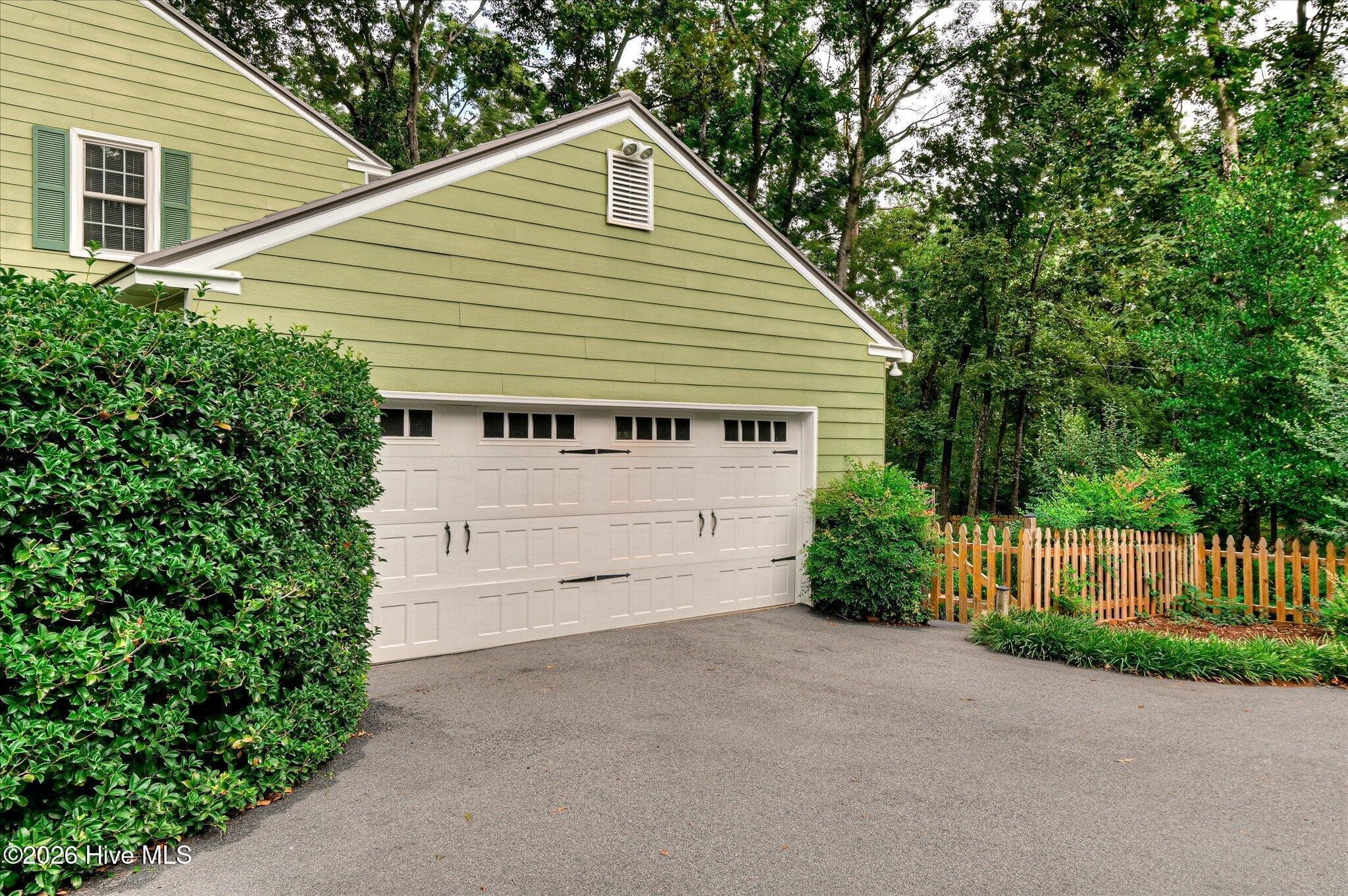 Plenty of driveway parking plus a double, side-entry garage. - 307 Wakefield Lane N, Martinez, GA 30907
