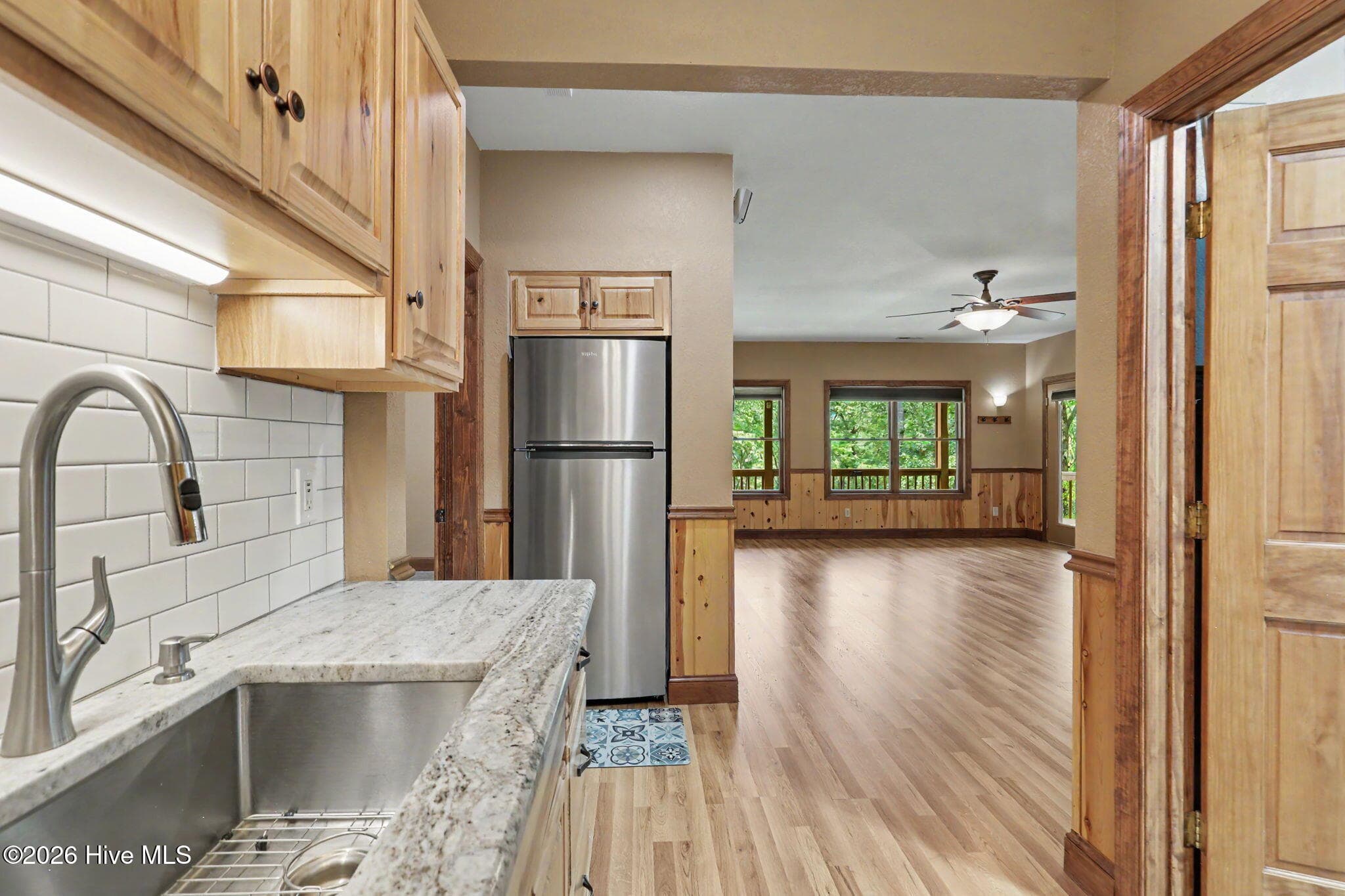 Lower-level kitchen opens directly to the expansive living area. - 210 Majestic Drive, Hayesville, NC 28904