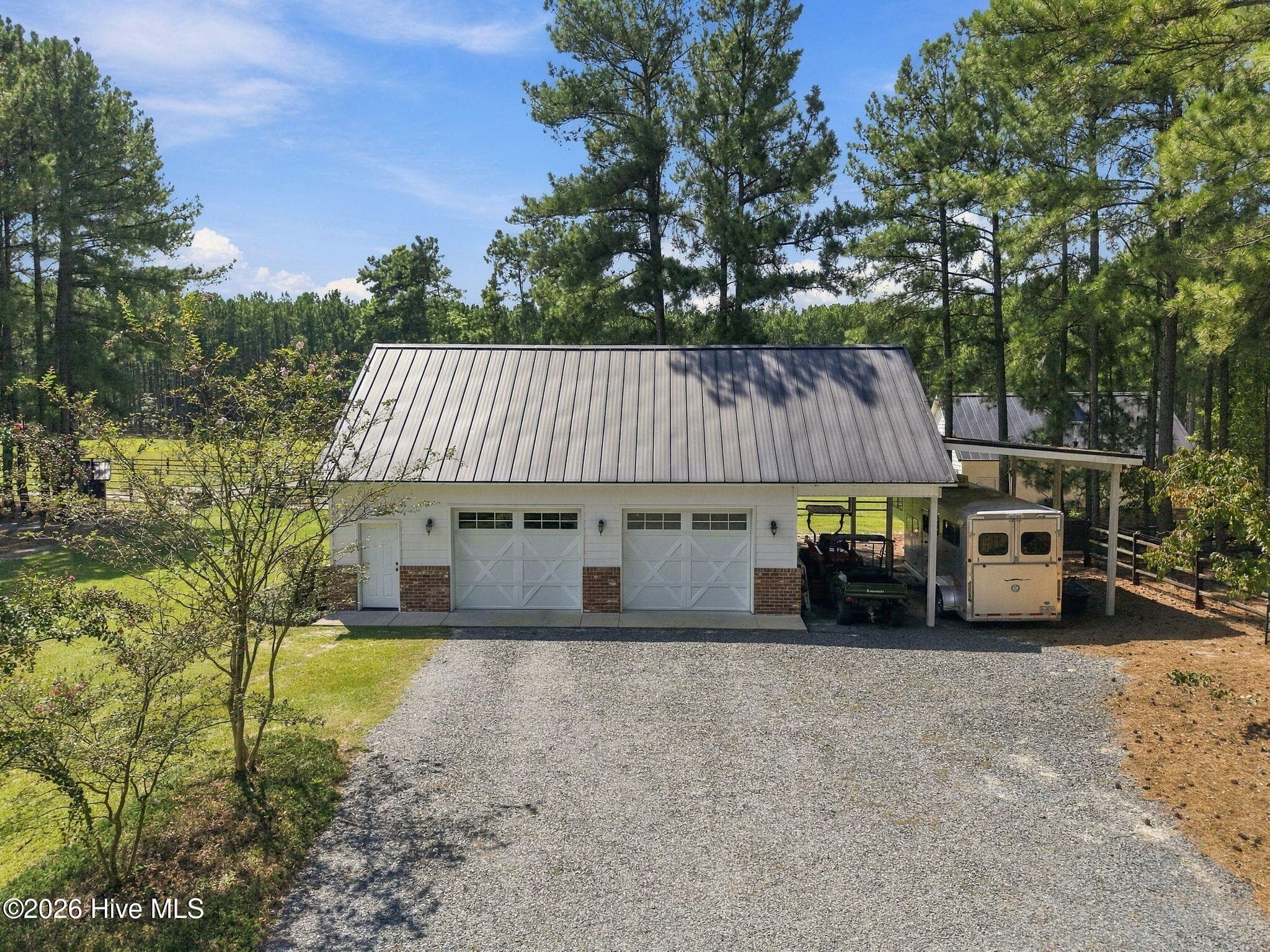 Detached garage with carports/equipment storage - 104 Meadows Lane, Aberdeen, NC 28315