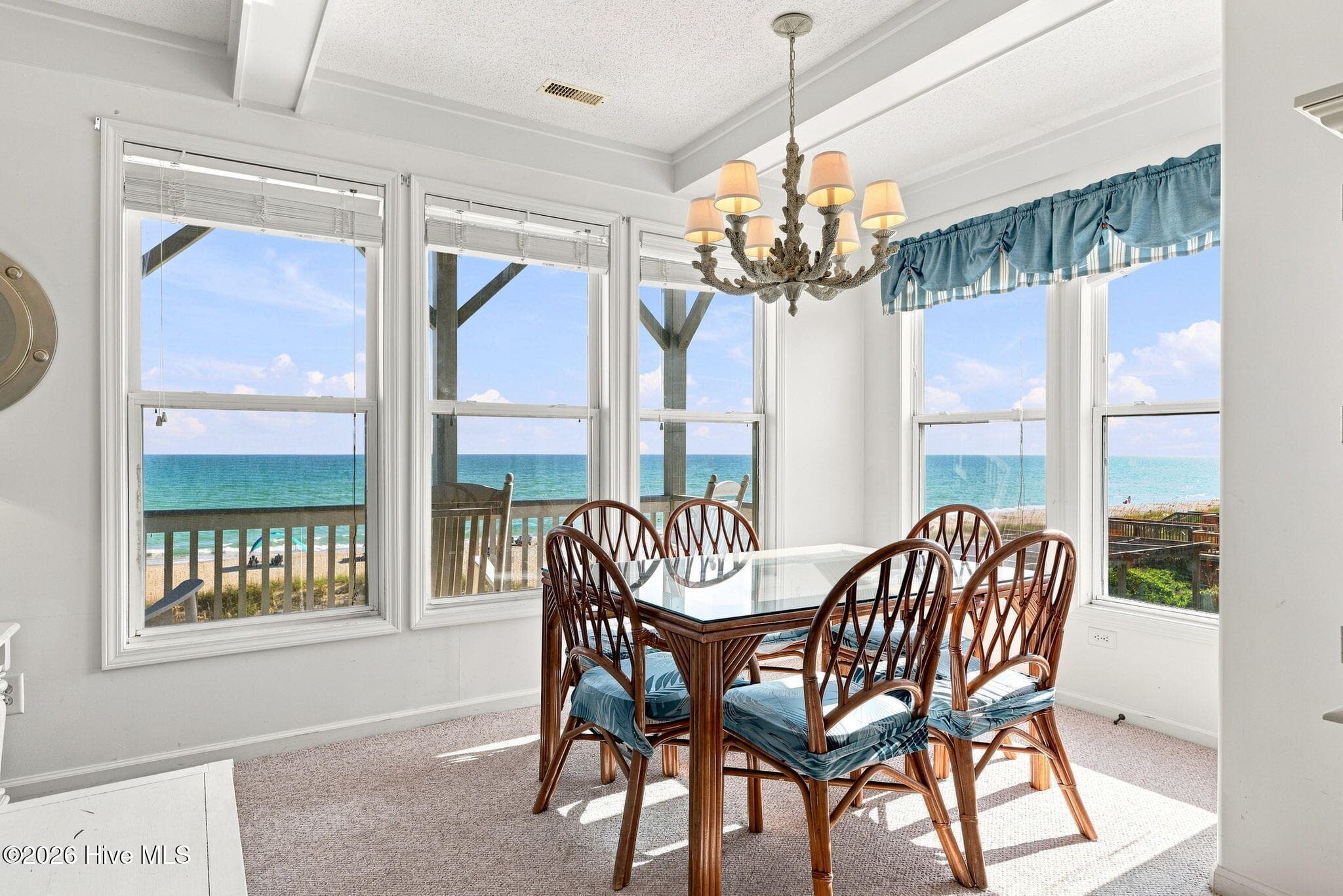 Enjoy the best of Emerald Isle oceanfront living from Unit B2, a second-floor 2-bedroom, 2-bath condo with AMAZING OCEANFRONT VIEWS in the desirable Pier Pointe community. - 2801 Pier Pointe Drive B2, Emerald Isle, NC 28594