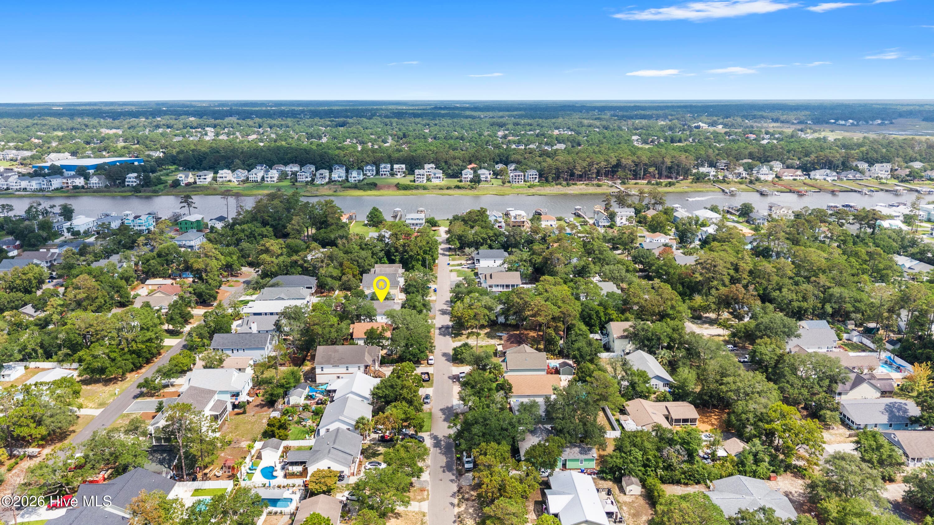 Looking northward toward the Intracoastal Waterway -- Property's approximate location is tagged with a yellow pin - 225 NE 39th Street, Oak Island, NC 28465