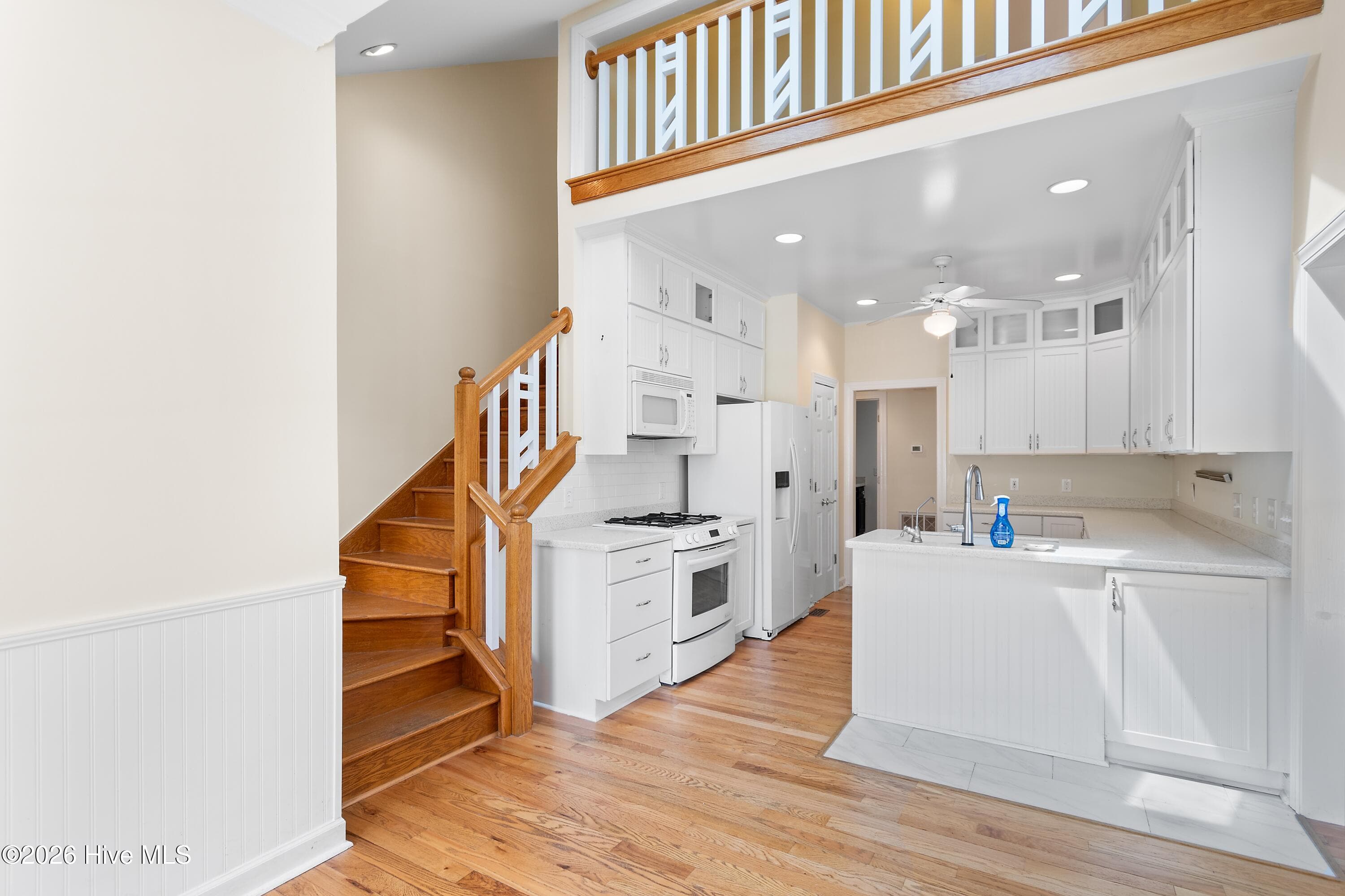 Kitchen with view of stairs - 4354 Marsh Elder Court, Southport, NC 28461