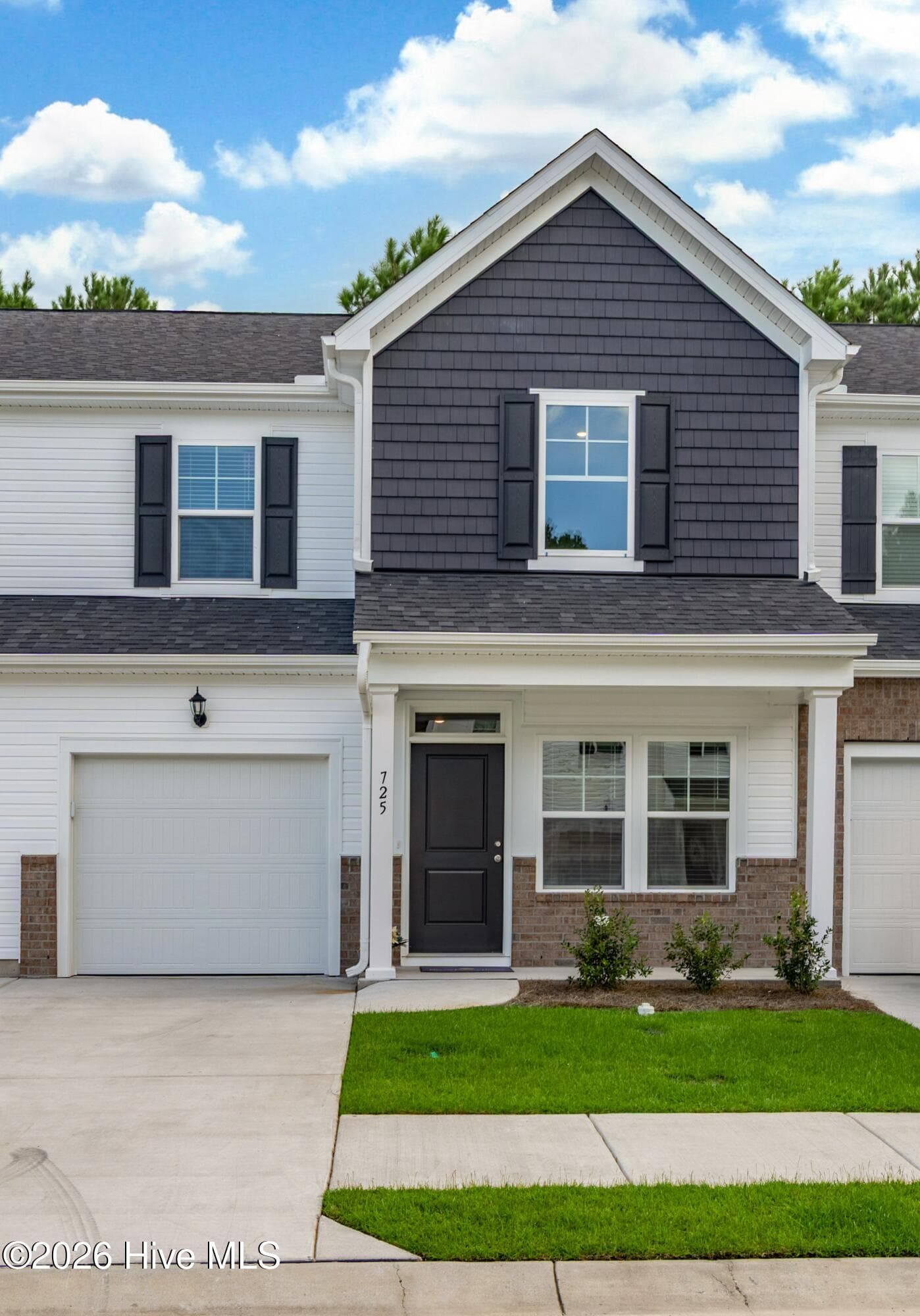 Front with brick accent - 725 Palm Frond Way NW, Calabash, NC 28467