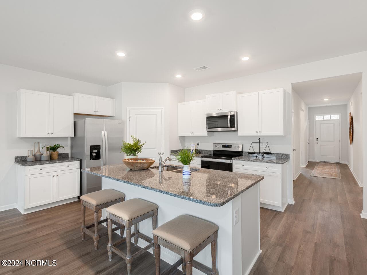 Exterior photo is of similar, completed home. Actual colors may vary - 1554 E White Egret Lane NE Lot 737, Bolivia, NC 28422