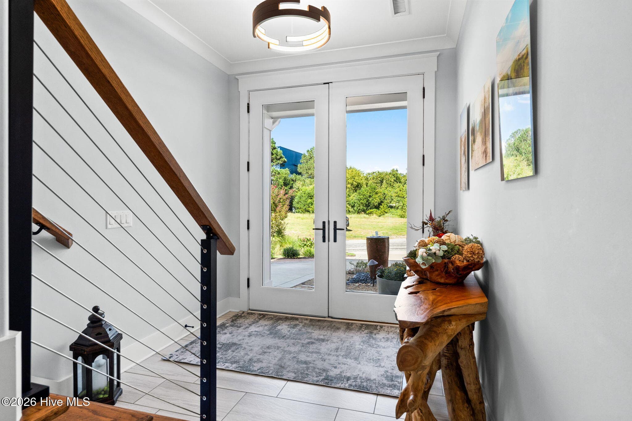 First floor entry to home opens to an inviting foyer - 2775 Long Bay Drive SE, Southport, NC 28461