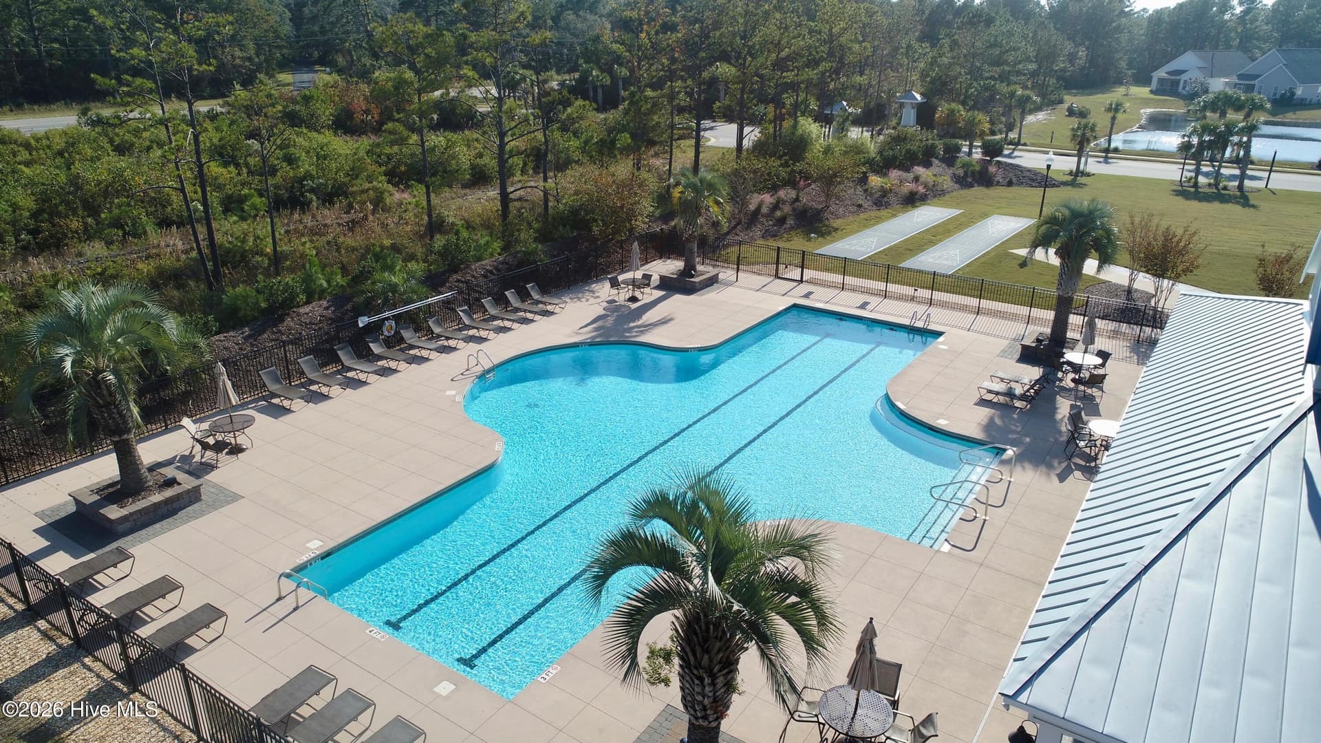 Community pool. - 6358 Bryson Drive SW, Ocean Isle Beach, NC 28469